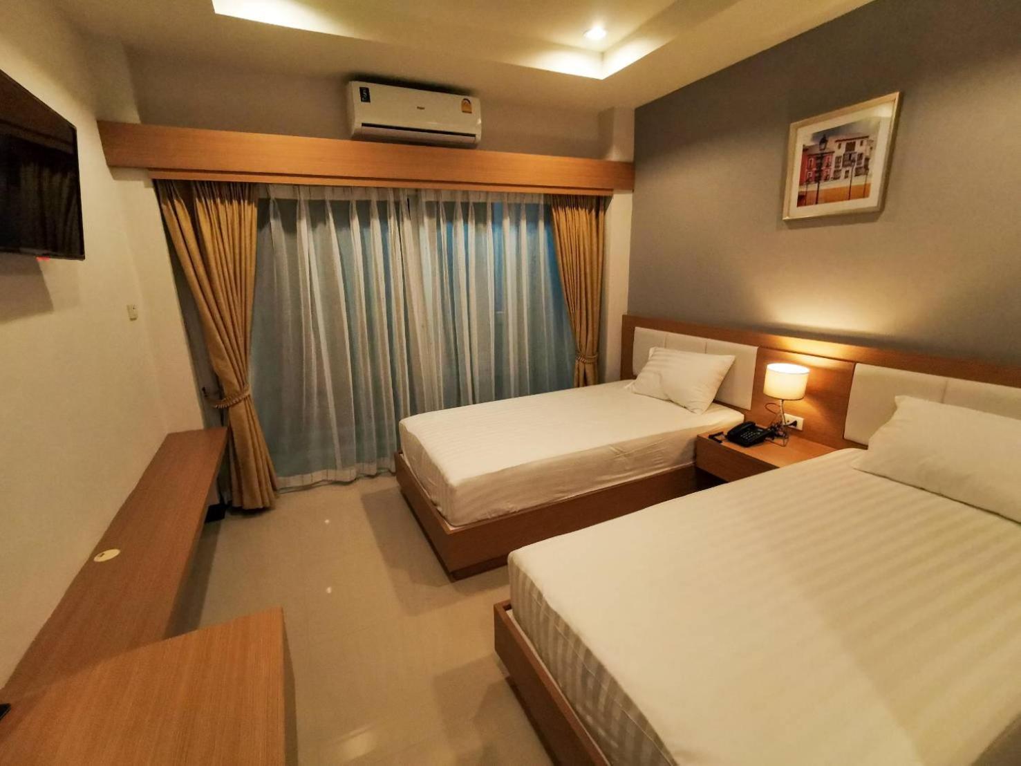 Standard Twin Room - Photo 3