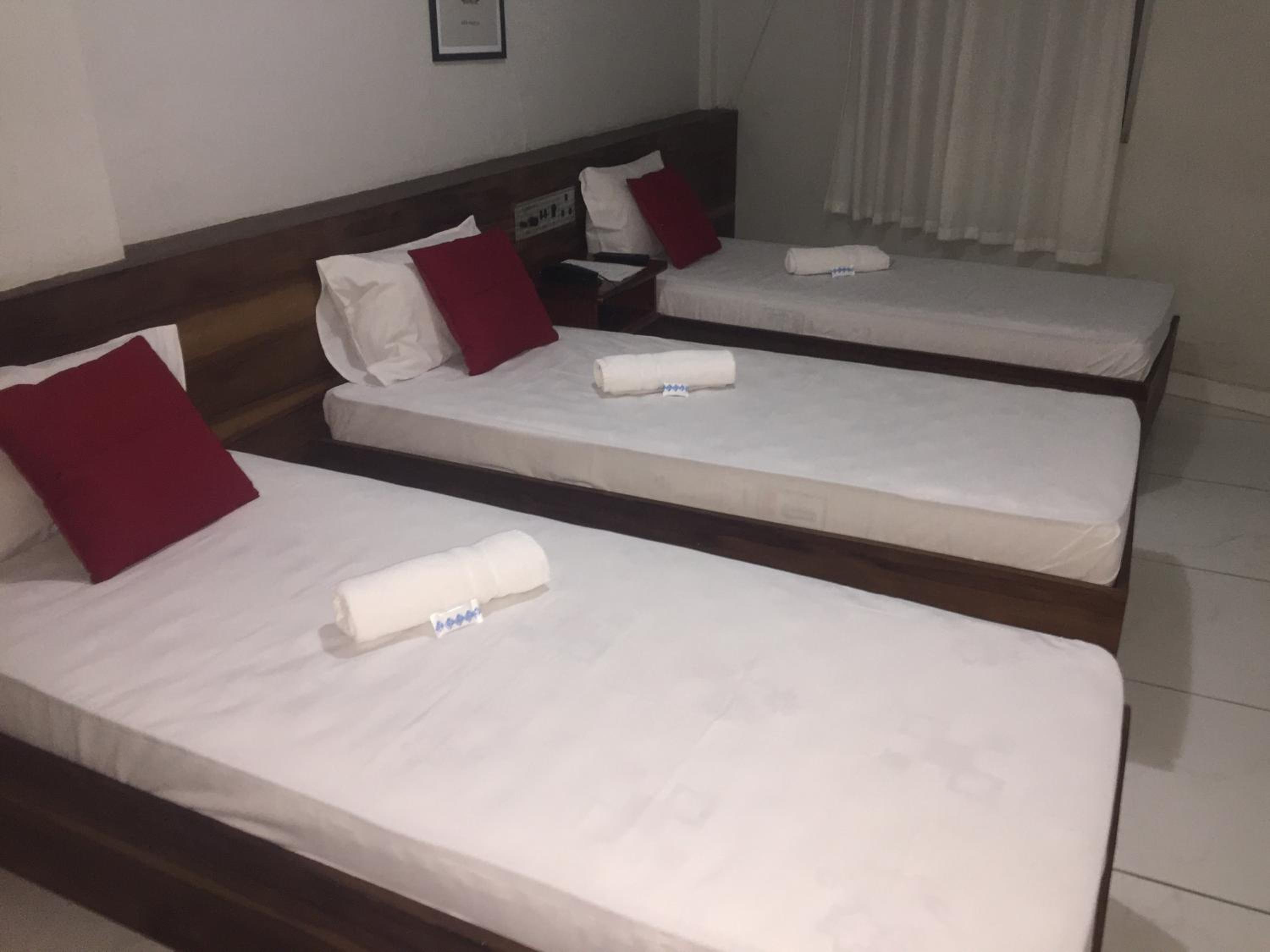 Standard Triple Room with 3 Single Beds