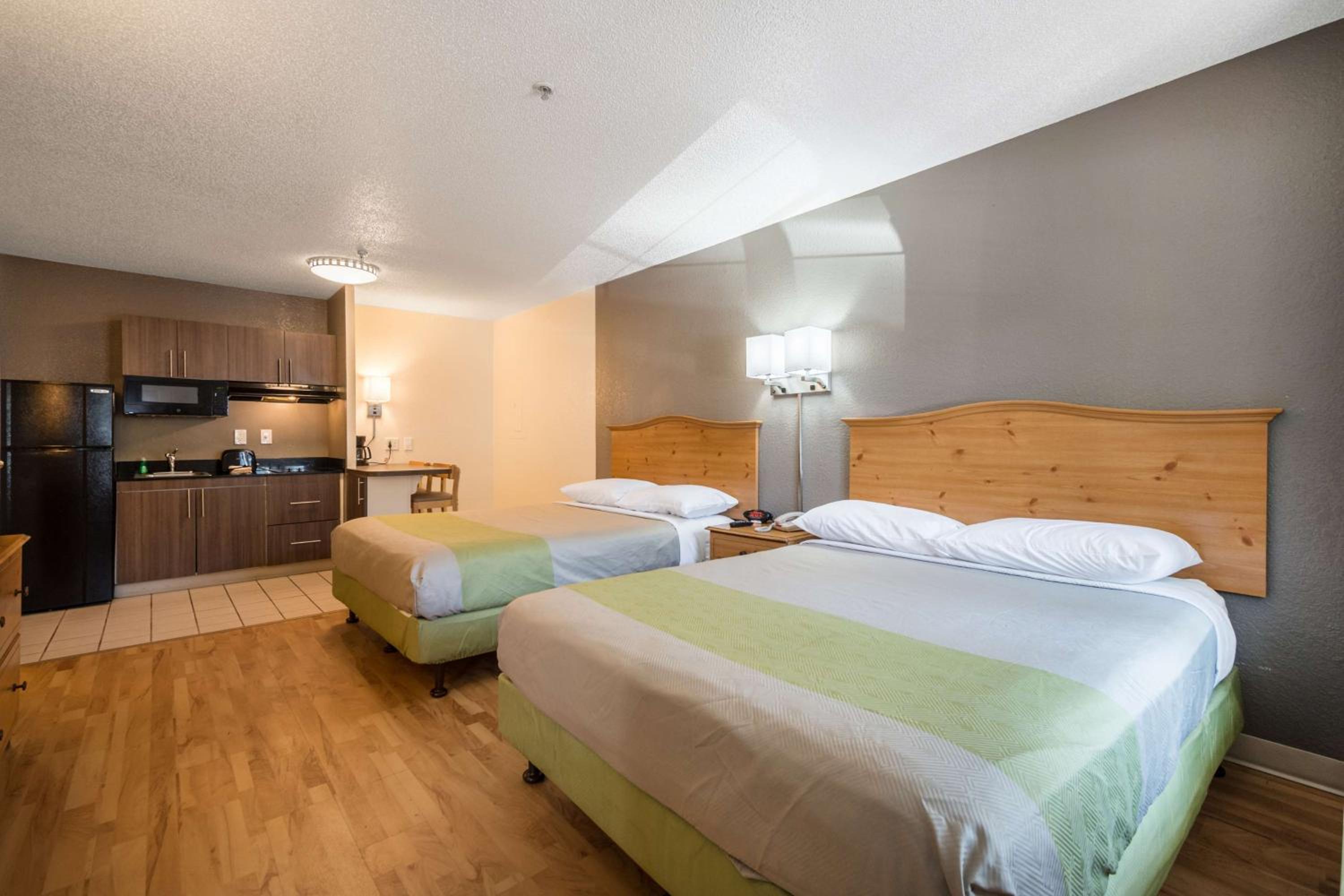 Queen Room with Two Queen Beds - Photo 1
