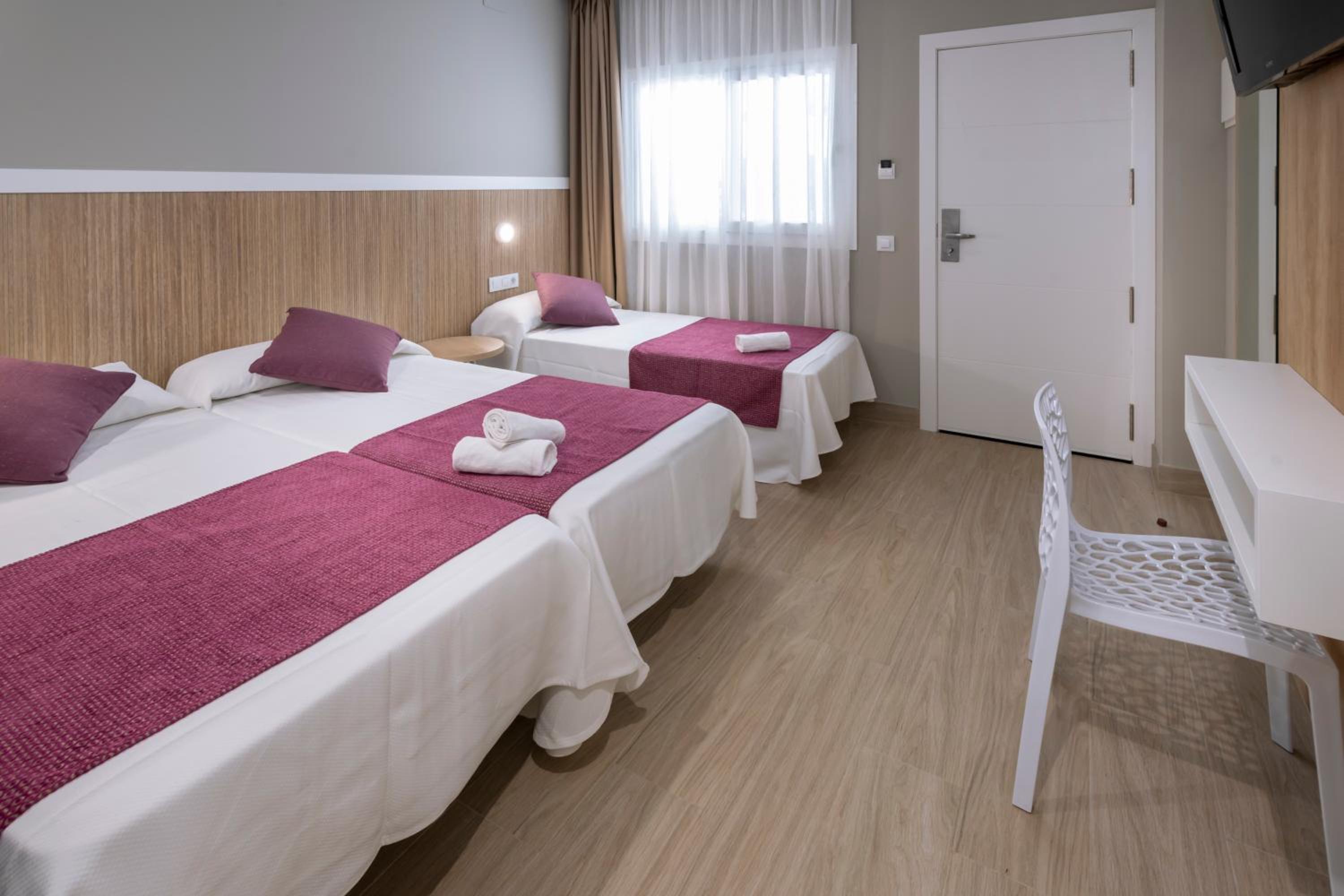 Habitación Triple en Planta Baja (2 adultos + 1 niño)