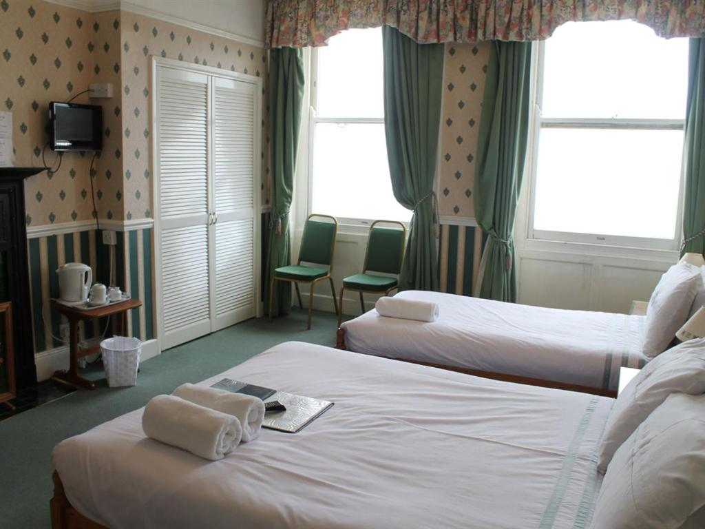 Superior Triple Room with Sea View - Photo 1