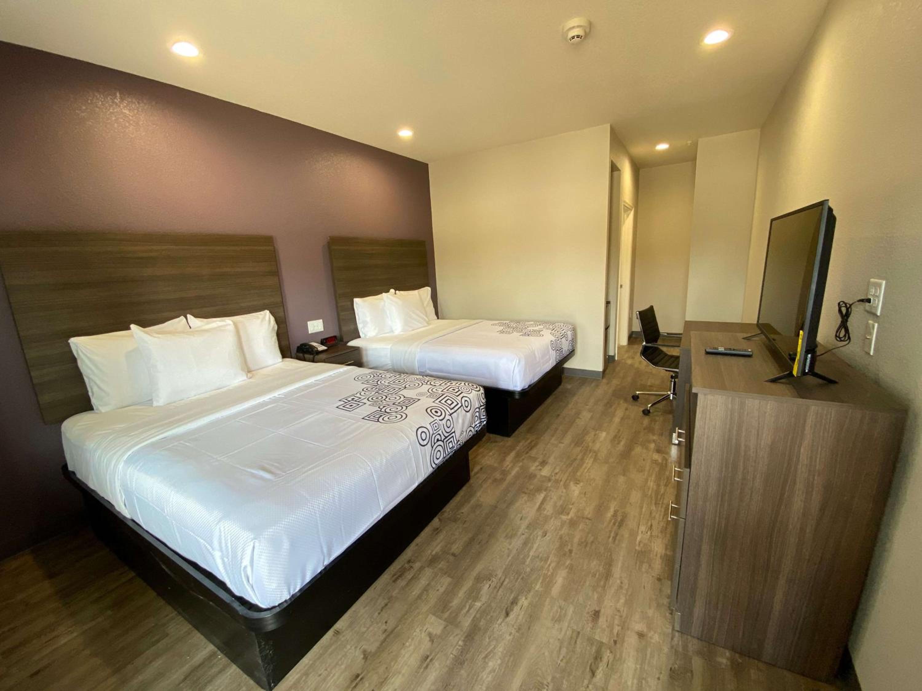 Queen Room with Two Queen Beds - Photo 1