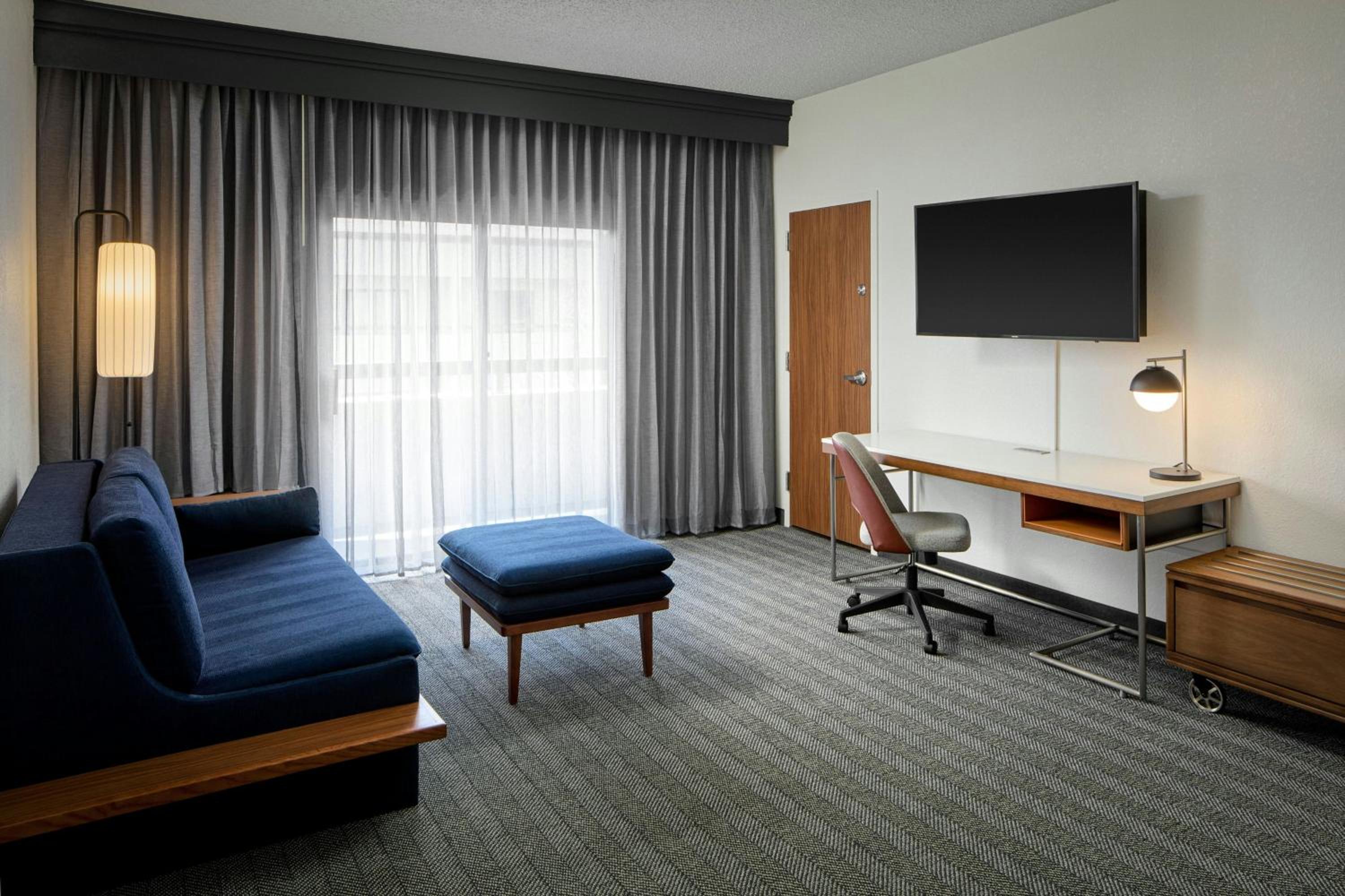 One-Bedroom Double Suite with Two Double Beds, Living Room and Sofa Bed