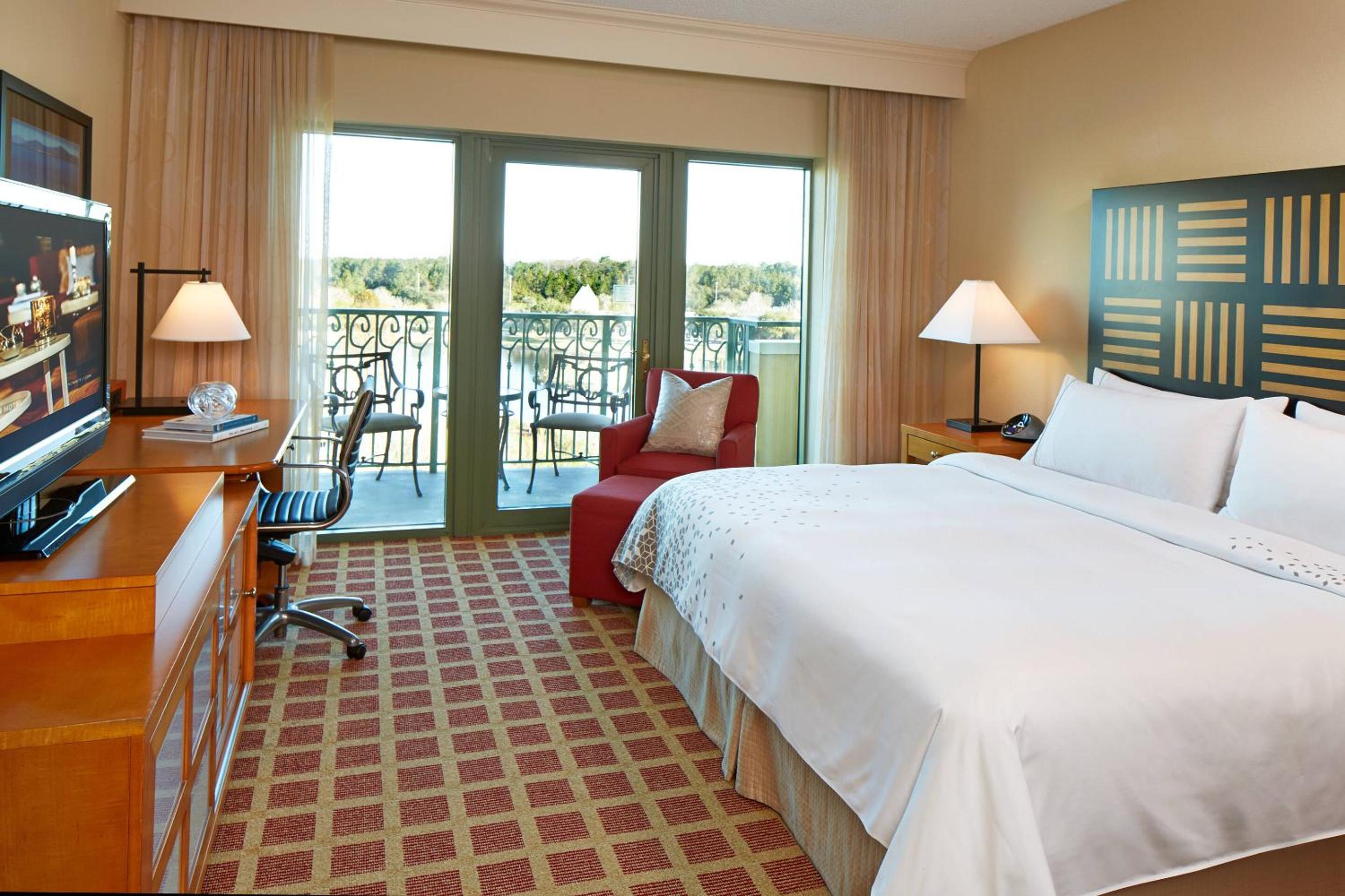 King Suite with Balcony - Photo 1