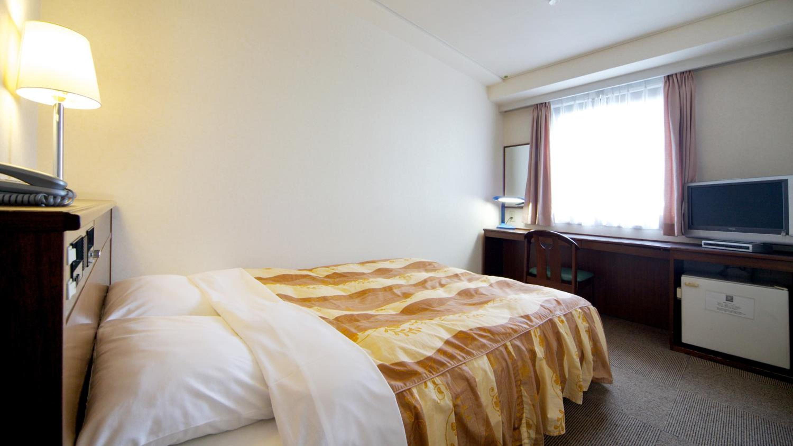 Semi Double Room - Non-Smoking - Photo 1