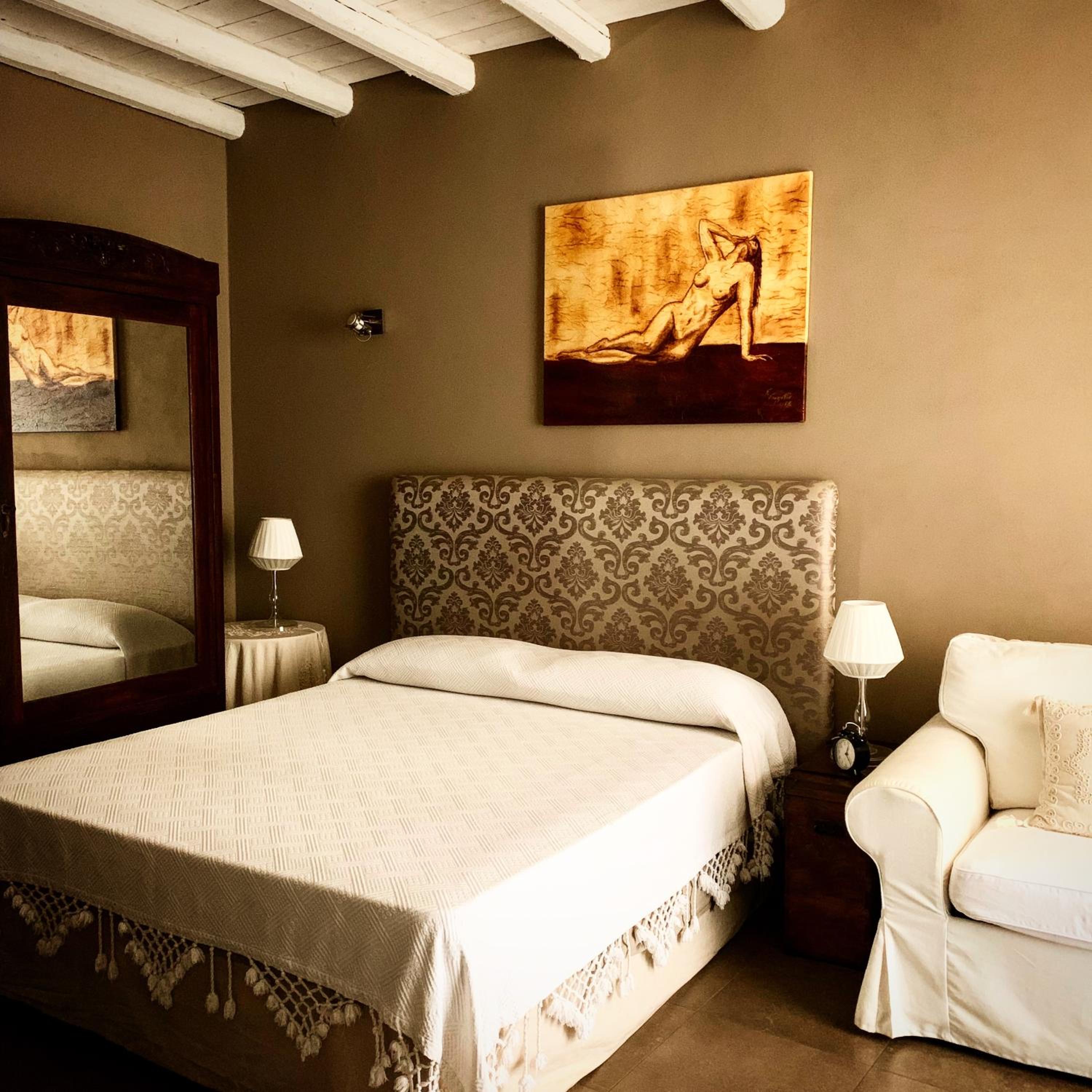 Quadruple Room with Balcony - Photo 1