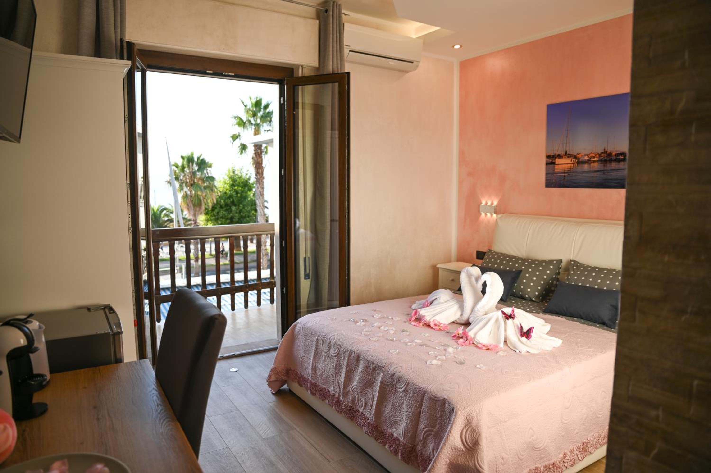 Quarto Duplo com Varanda e Vista para o Mar