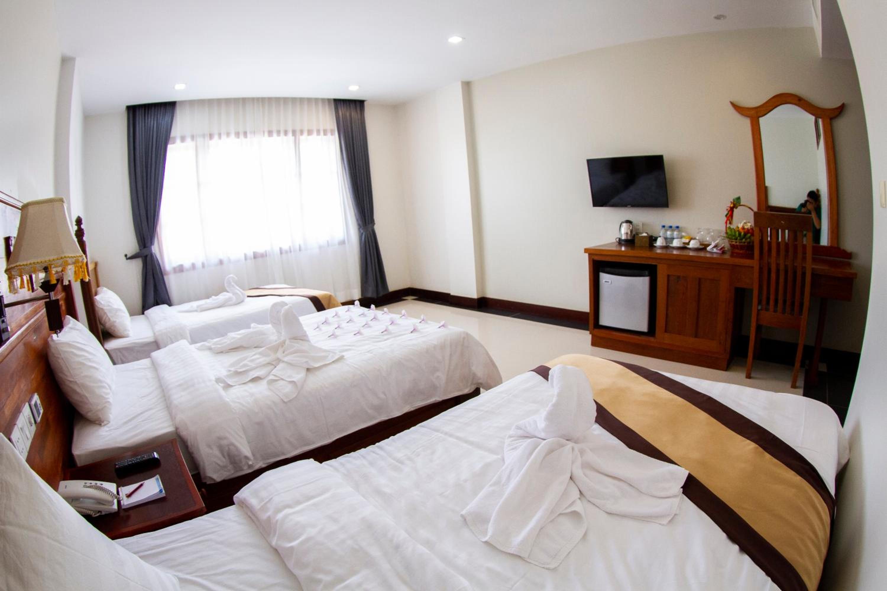 Deluxe Triple Room - Photo 8