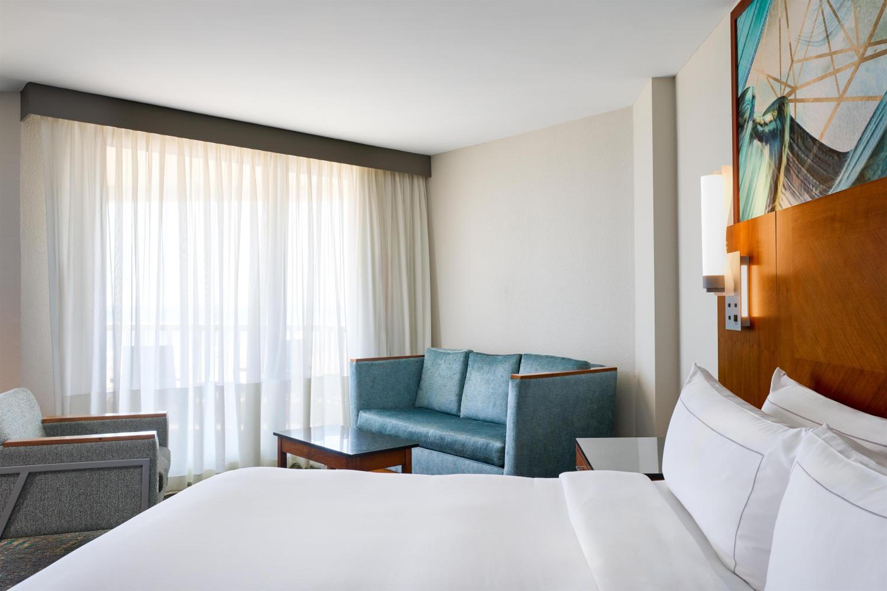 Corner King Room with Sofa Bed and Oceanfront View