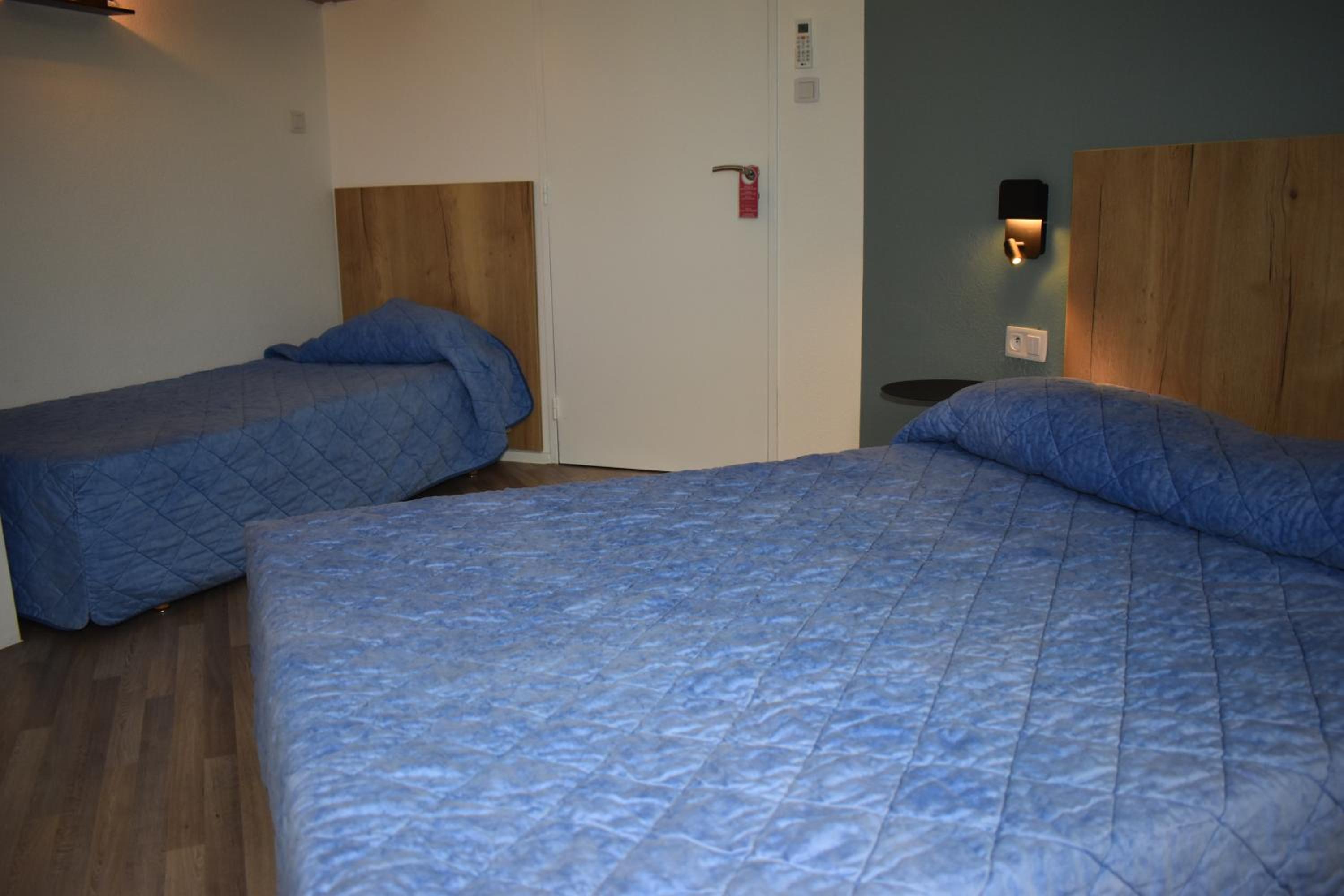 Triple Room - Photo 1