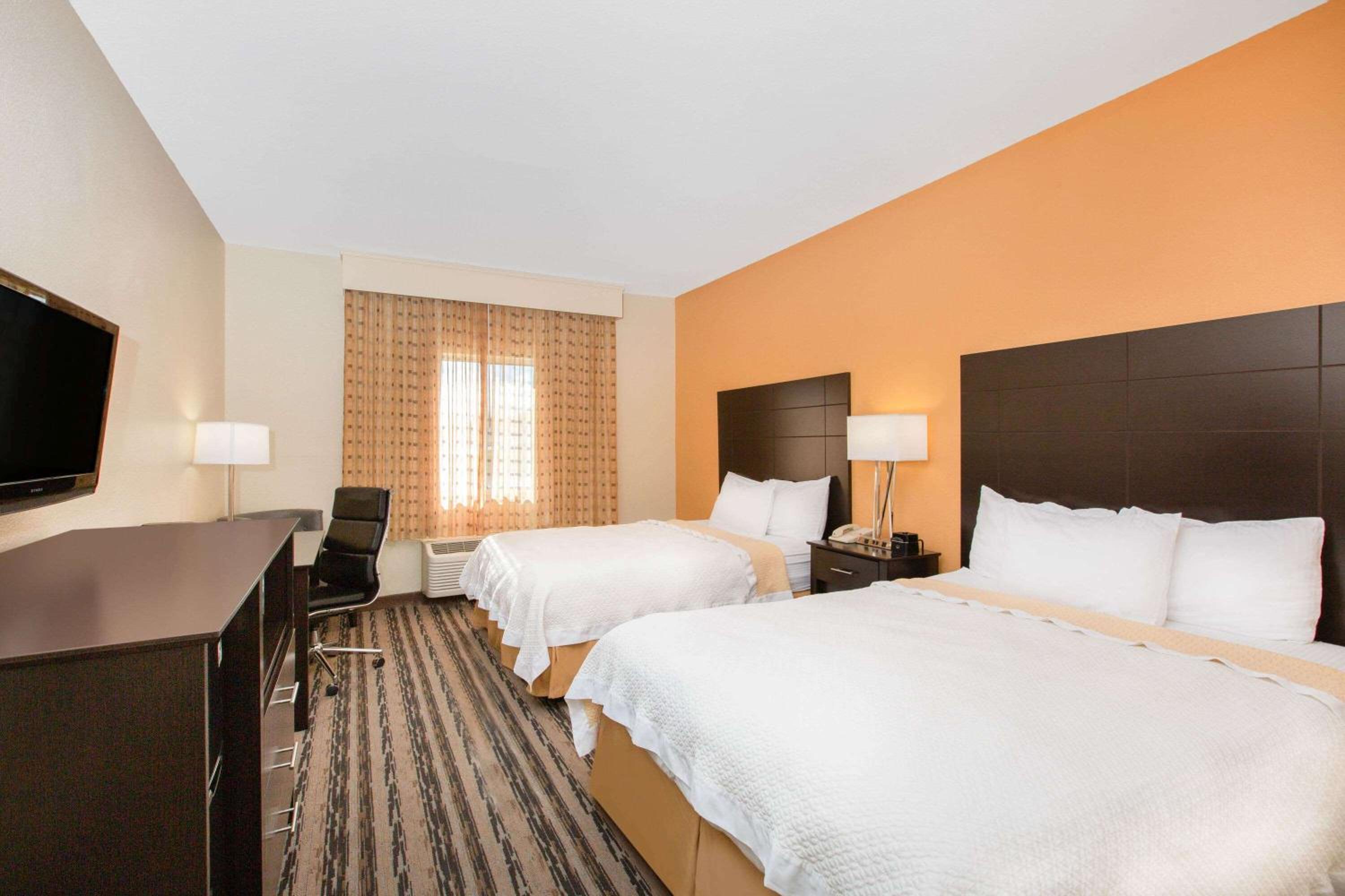 Deluxe Queen Room with Two Queen Beds - Photo 1