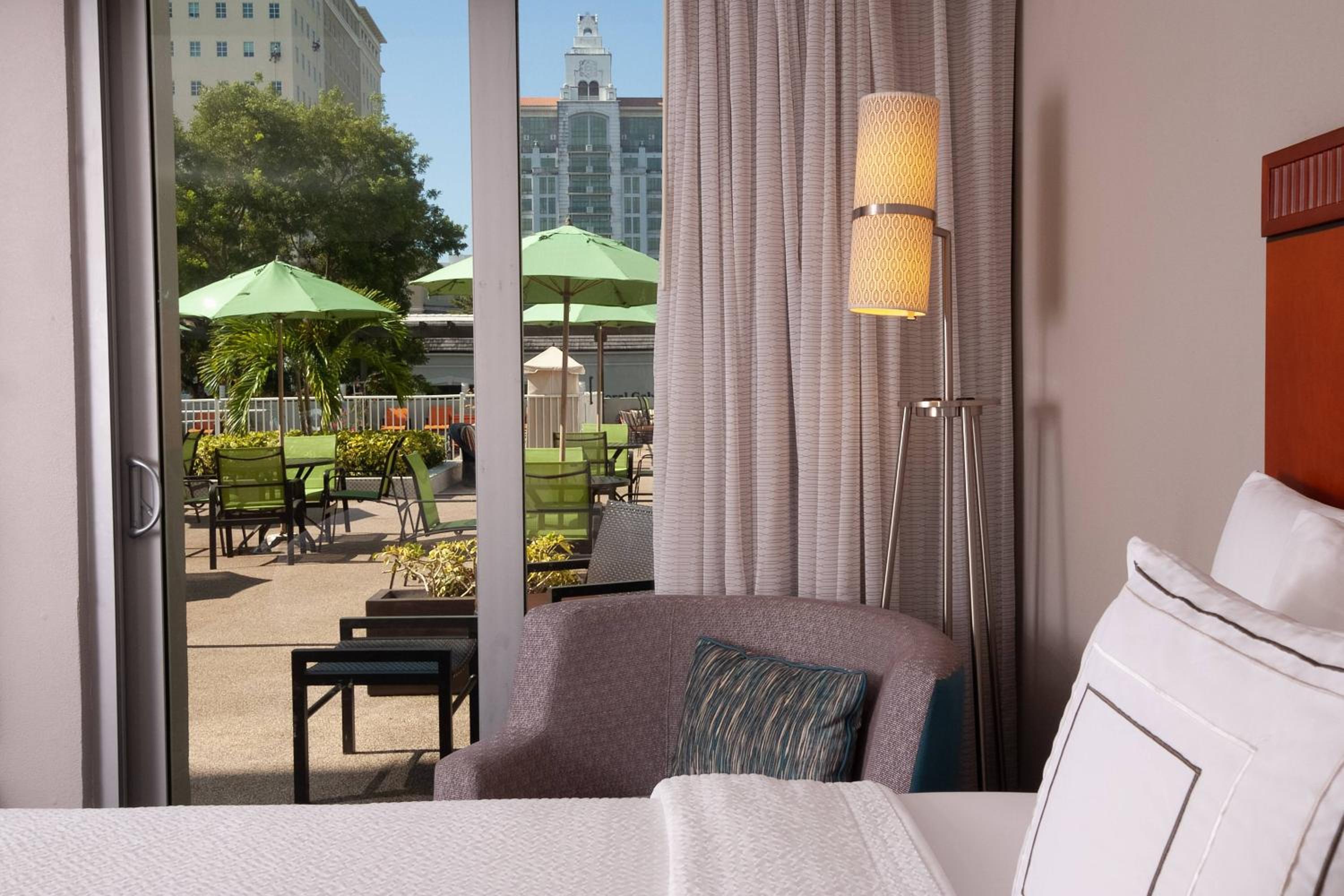 Queen Room with Two Queen Beds and Poolside Access photo 2