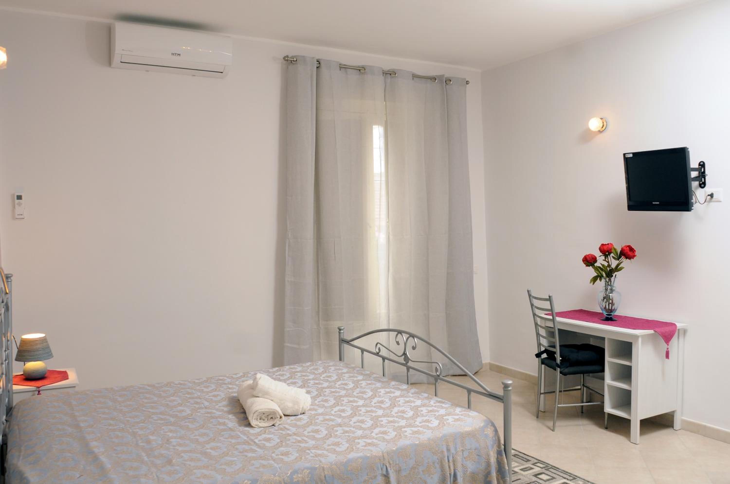 Quadruple Room - Photo 7