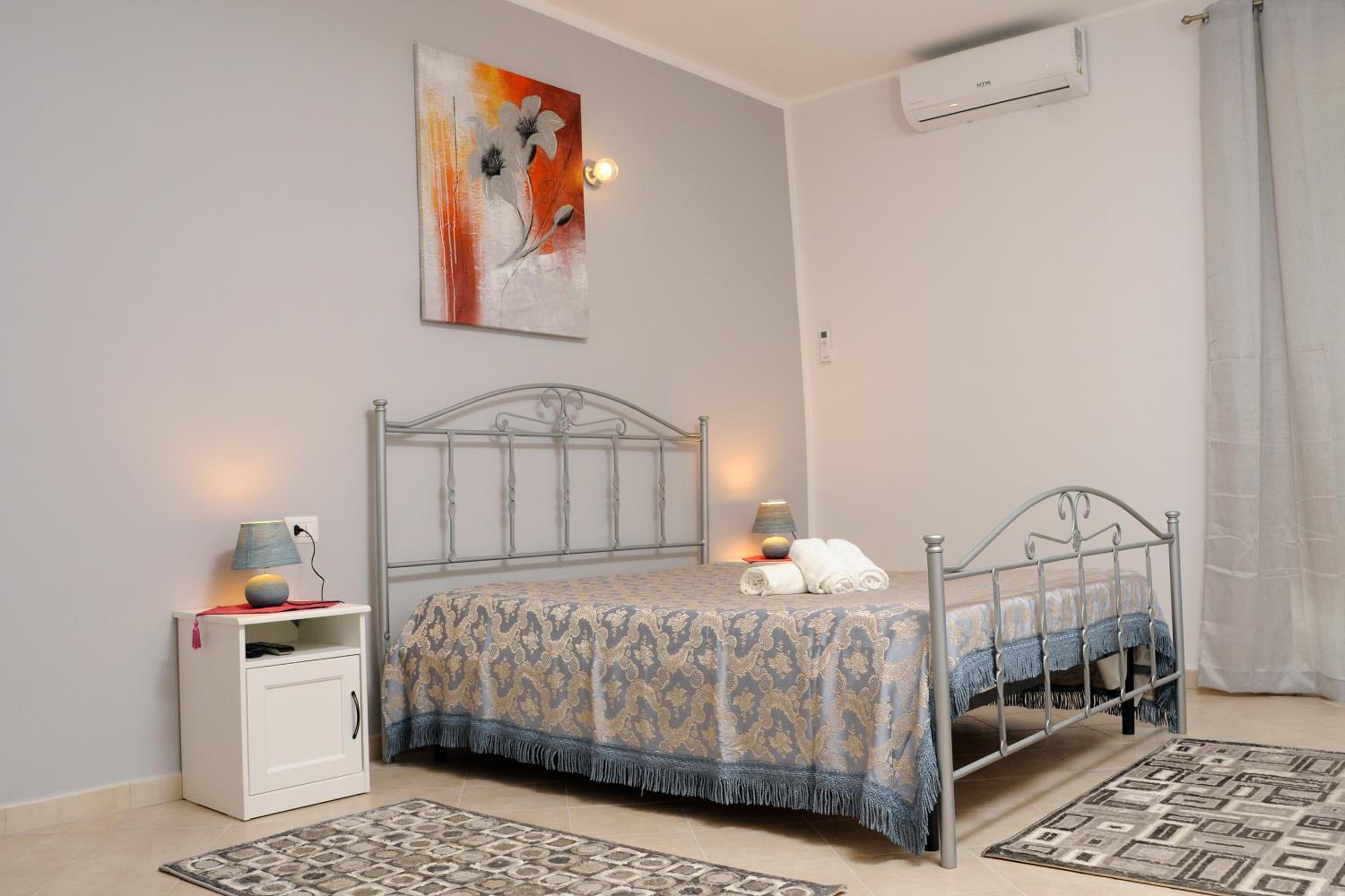 Quadruple Room - Photo 8