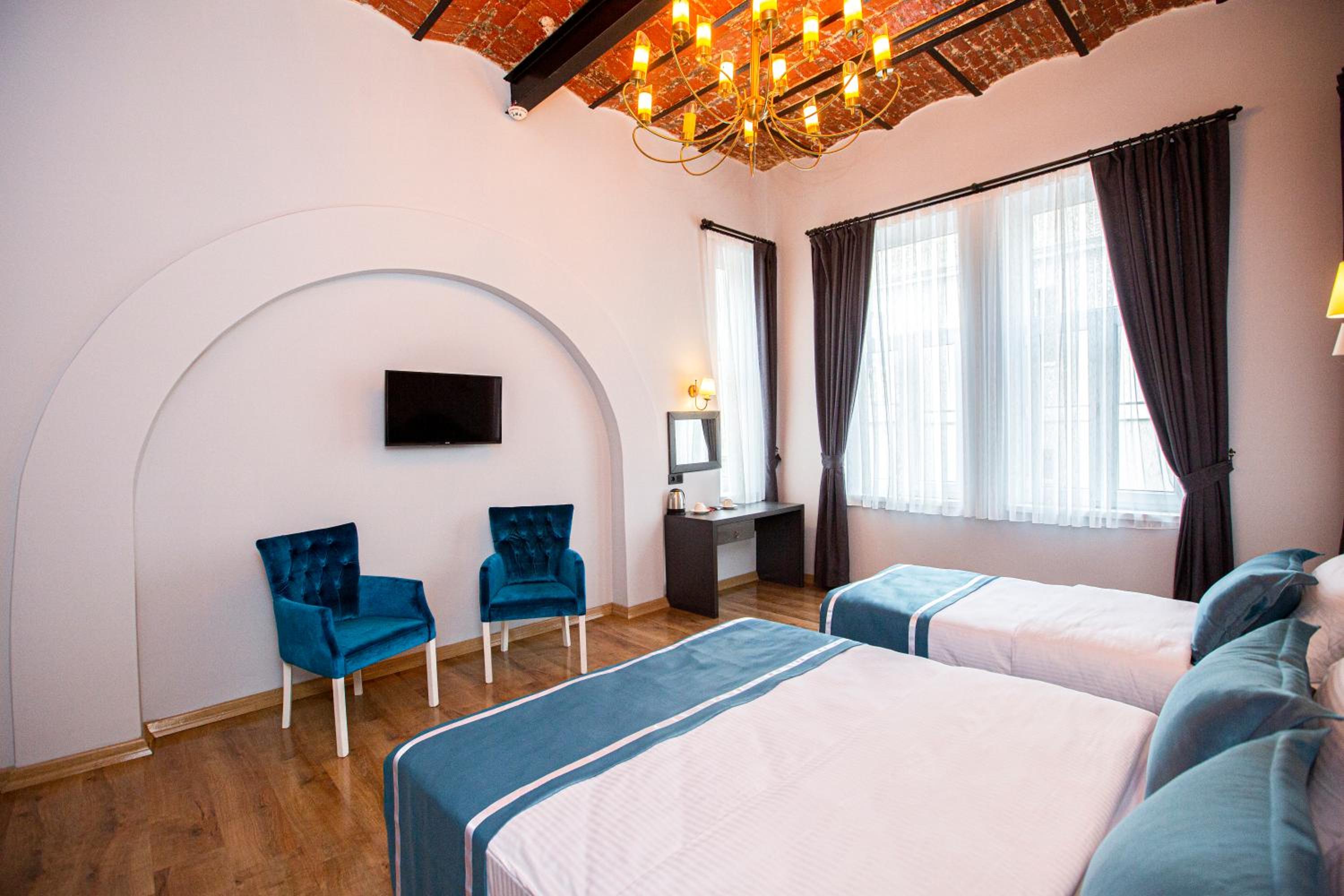 Deluxe Triple Room