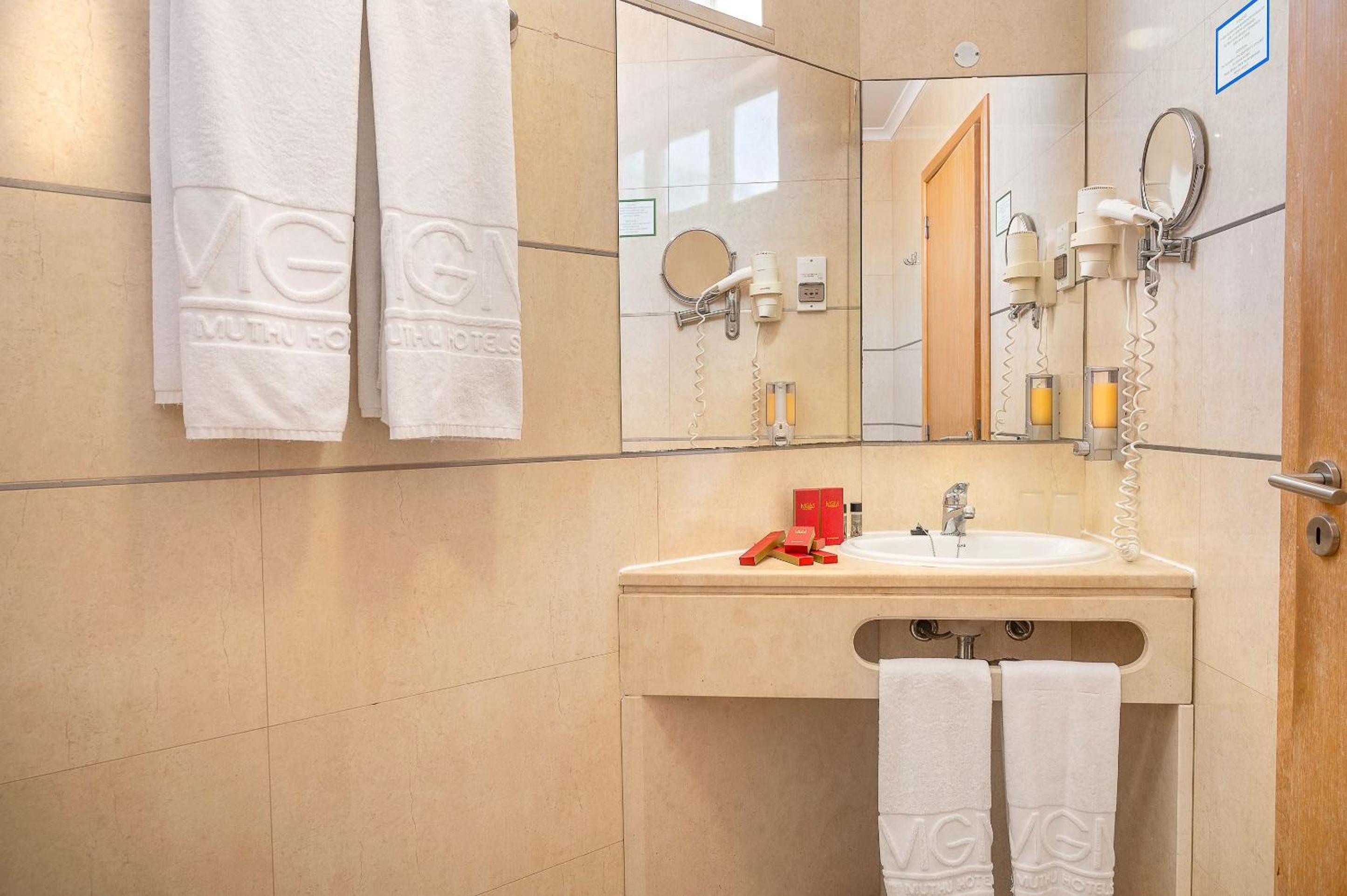 Relax in a stylish, modern bathroom retreat.