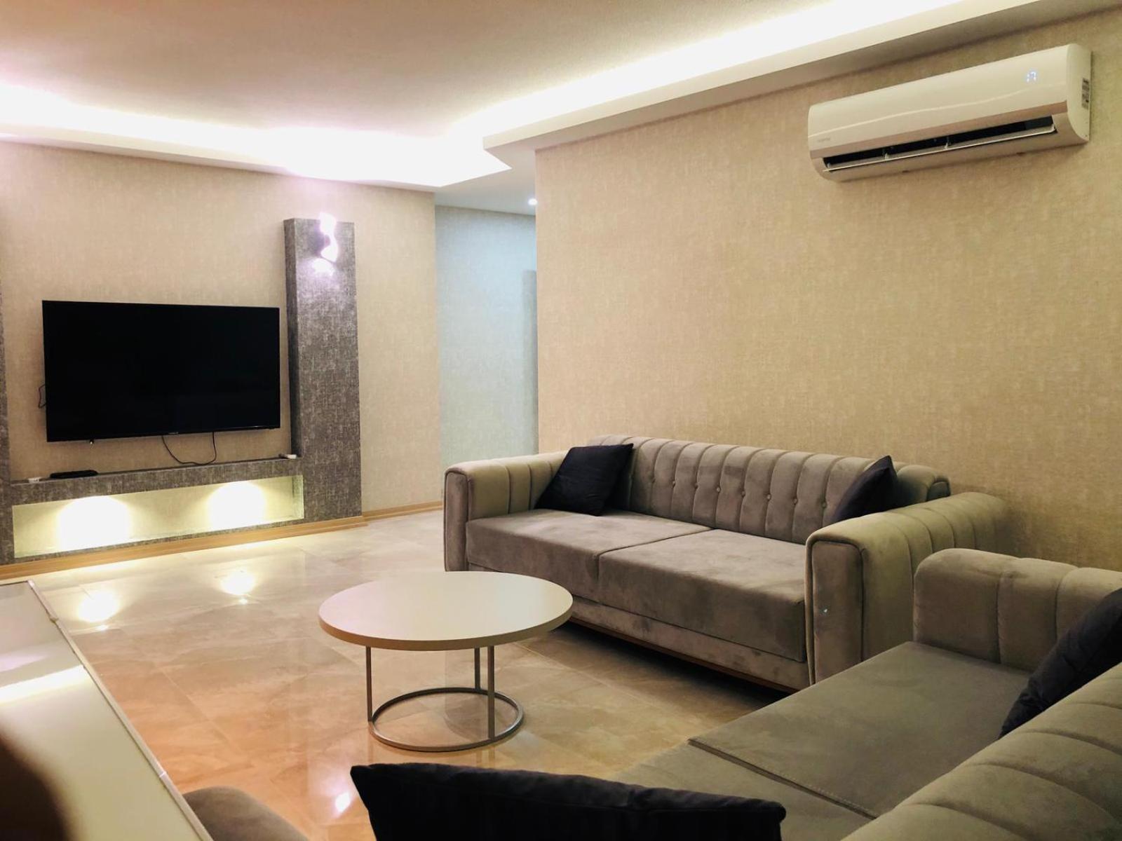 Three-Bedroom Apartment - Photo 12