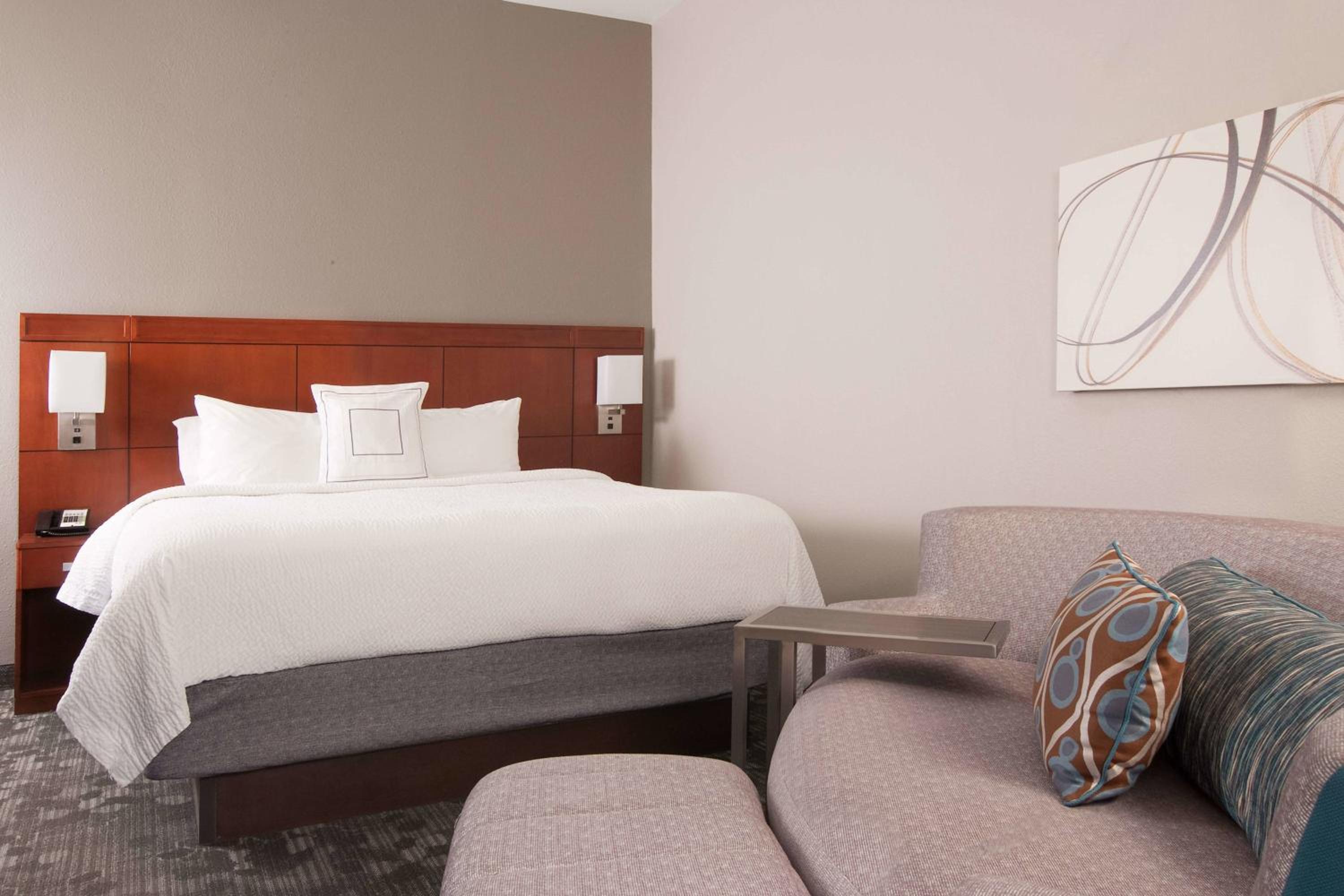 Larger Corner King Room with Water View, Balcony and Sofa Bed