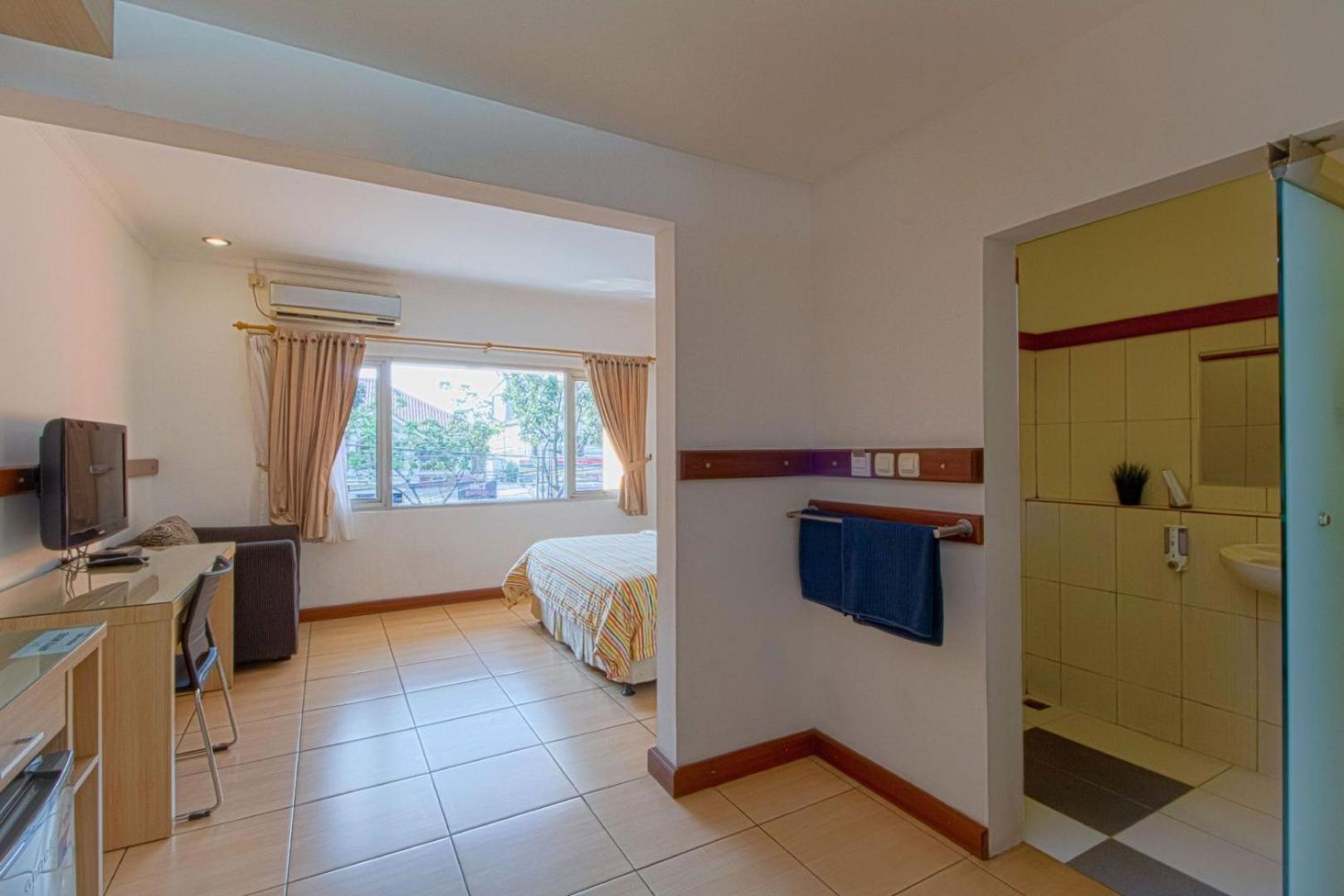 Deluxe Room - Photo 5