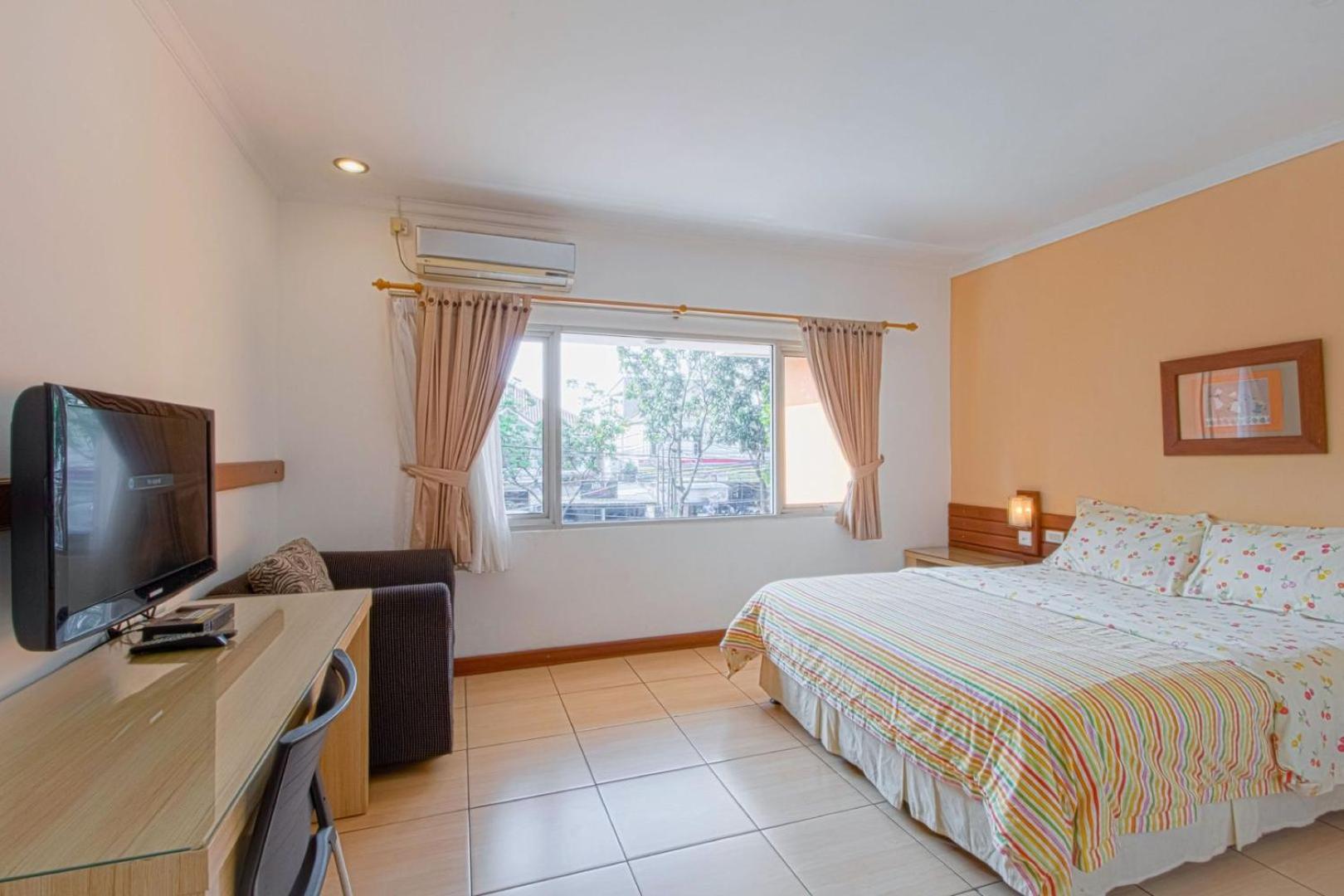 Deluxe Room - Photo 1