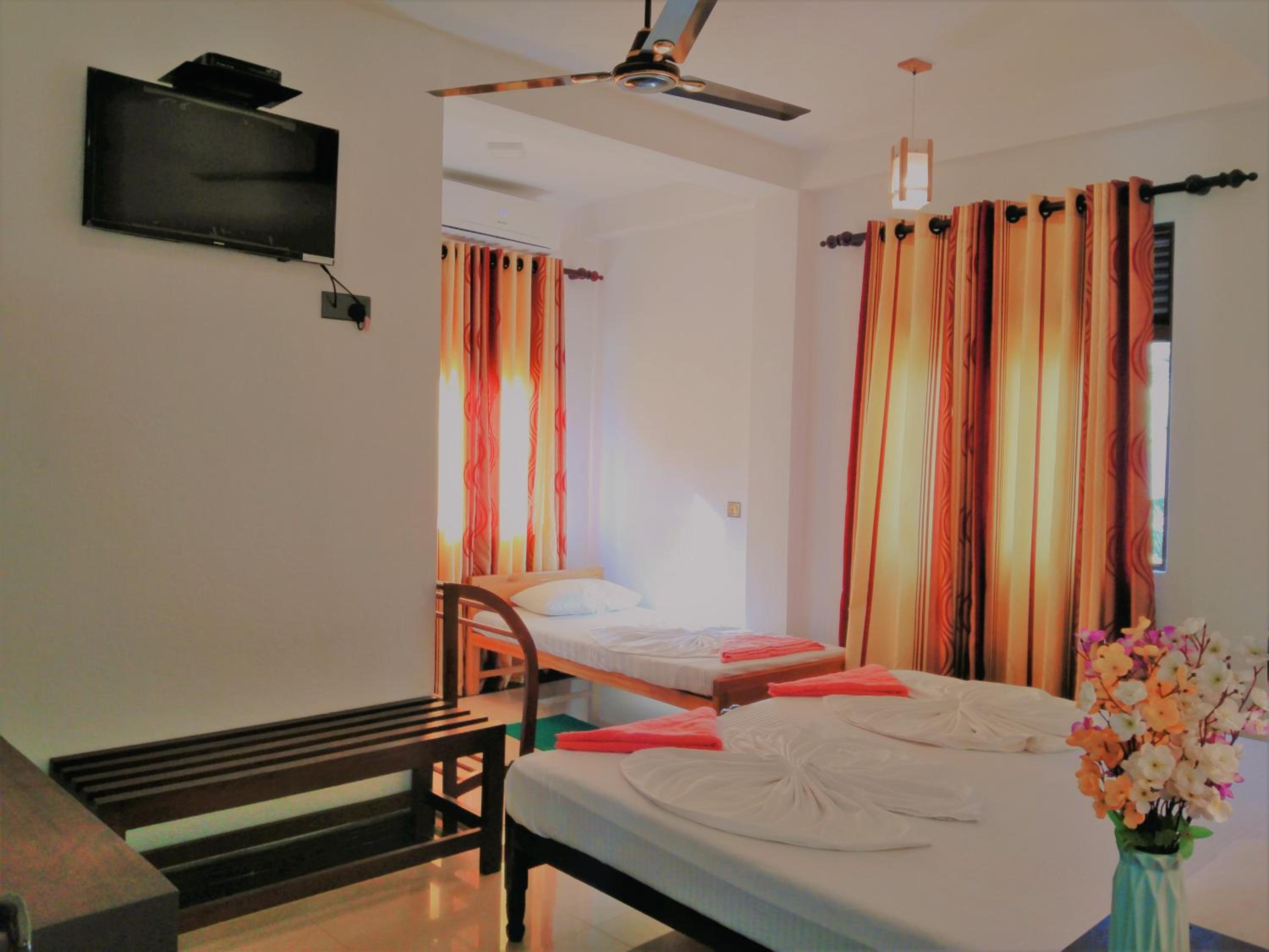 Deluxe Triple Room