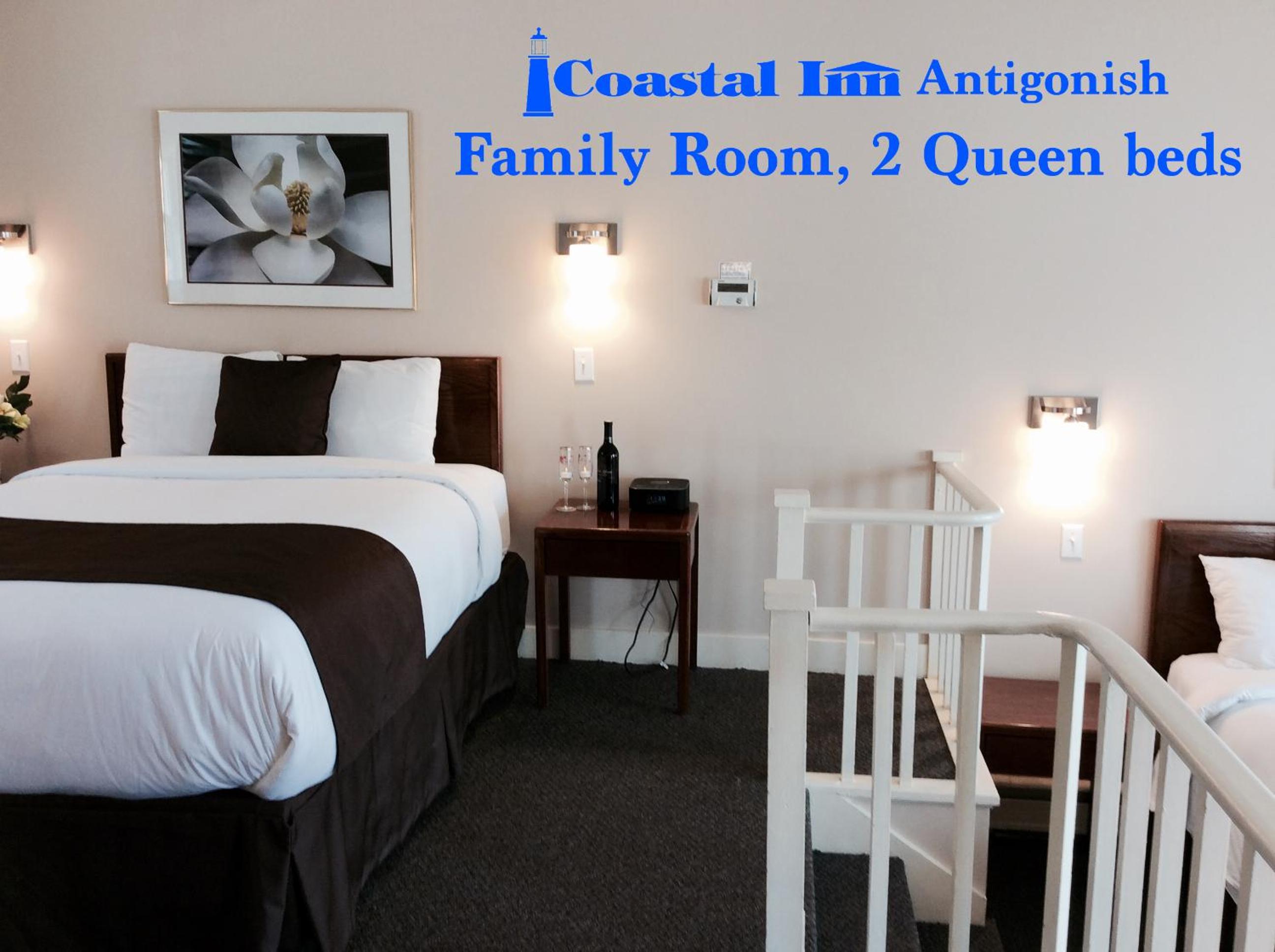 Bi-level Family Room, 2 Queen Beds - Nonsmoking, No pets photo 1