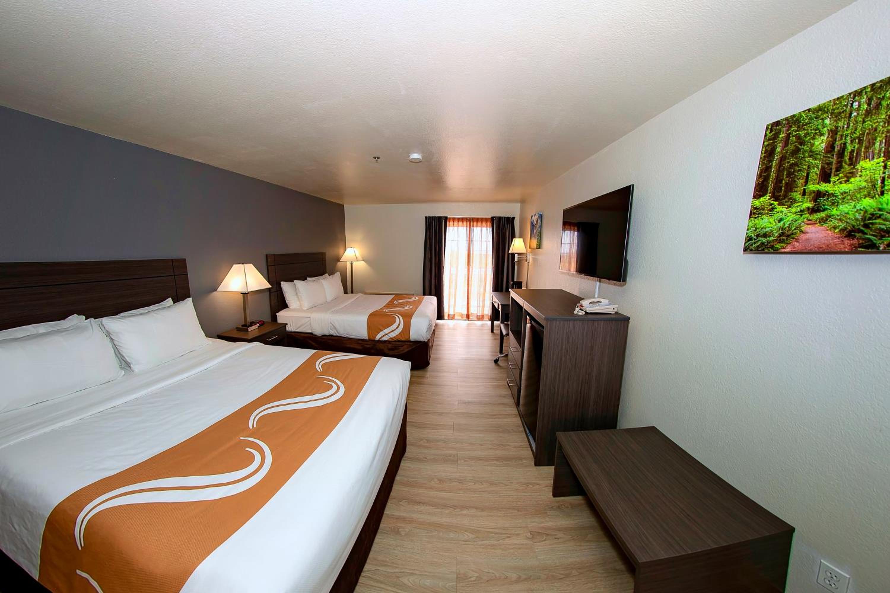 Queen Room with Two Queen Beds and Balcony - Photo 1