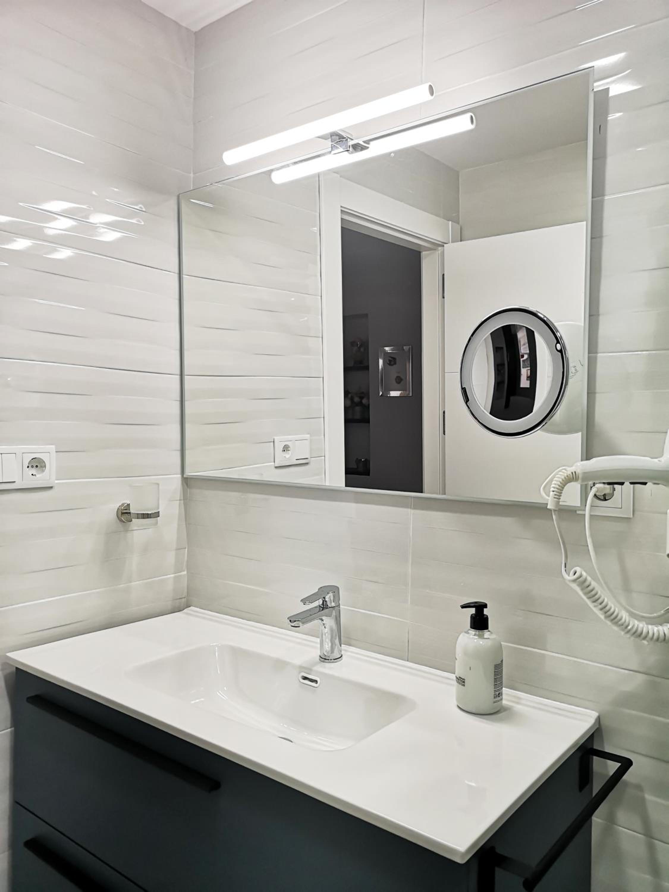 Three-Bedroom Apartment - Photo 46