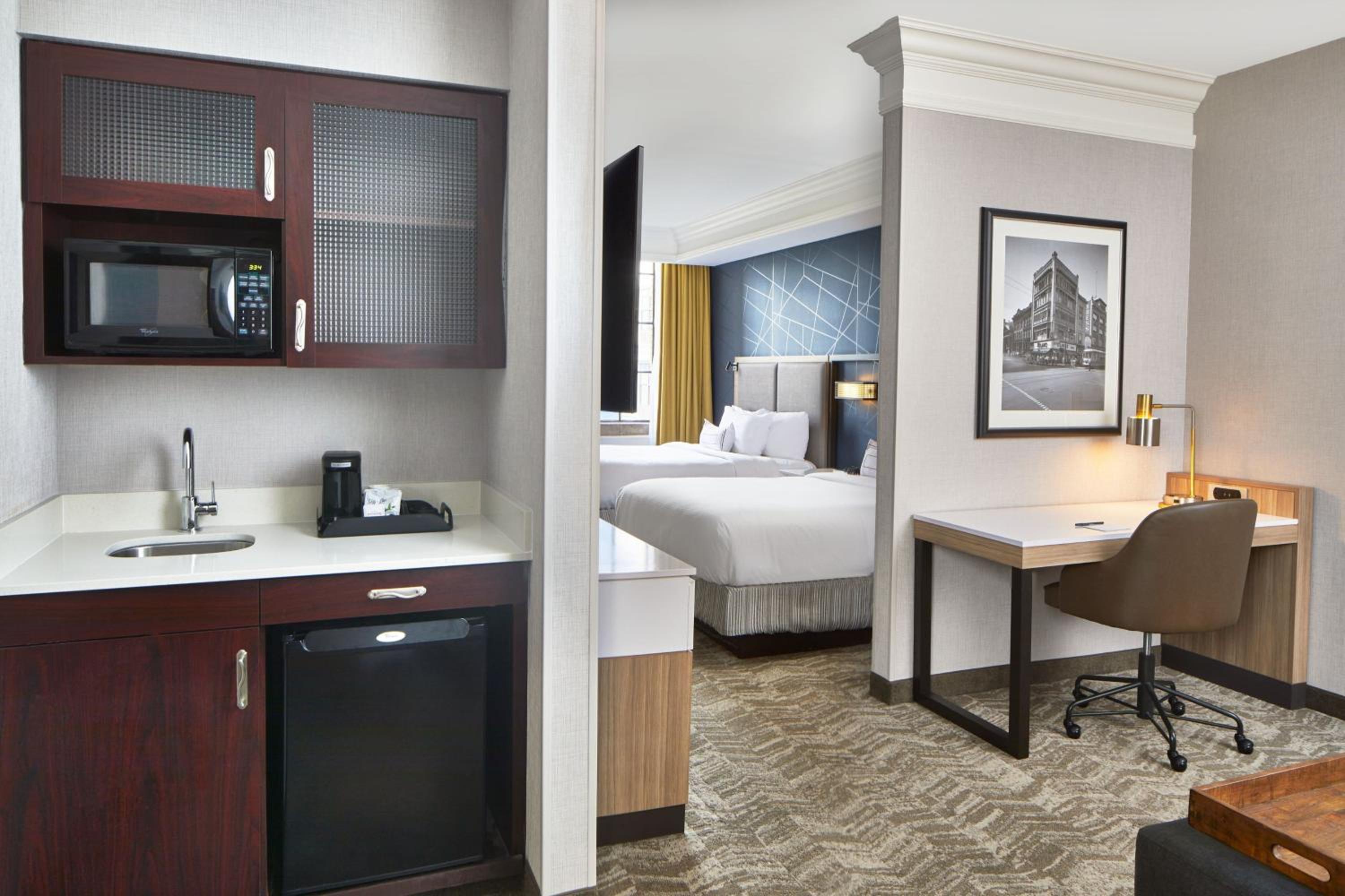 Larger Queen Suite with Two Queen Beds and Trundle Sofa