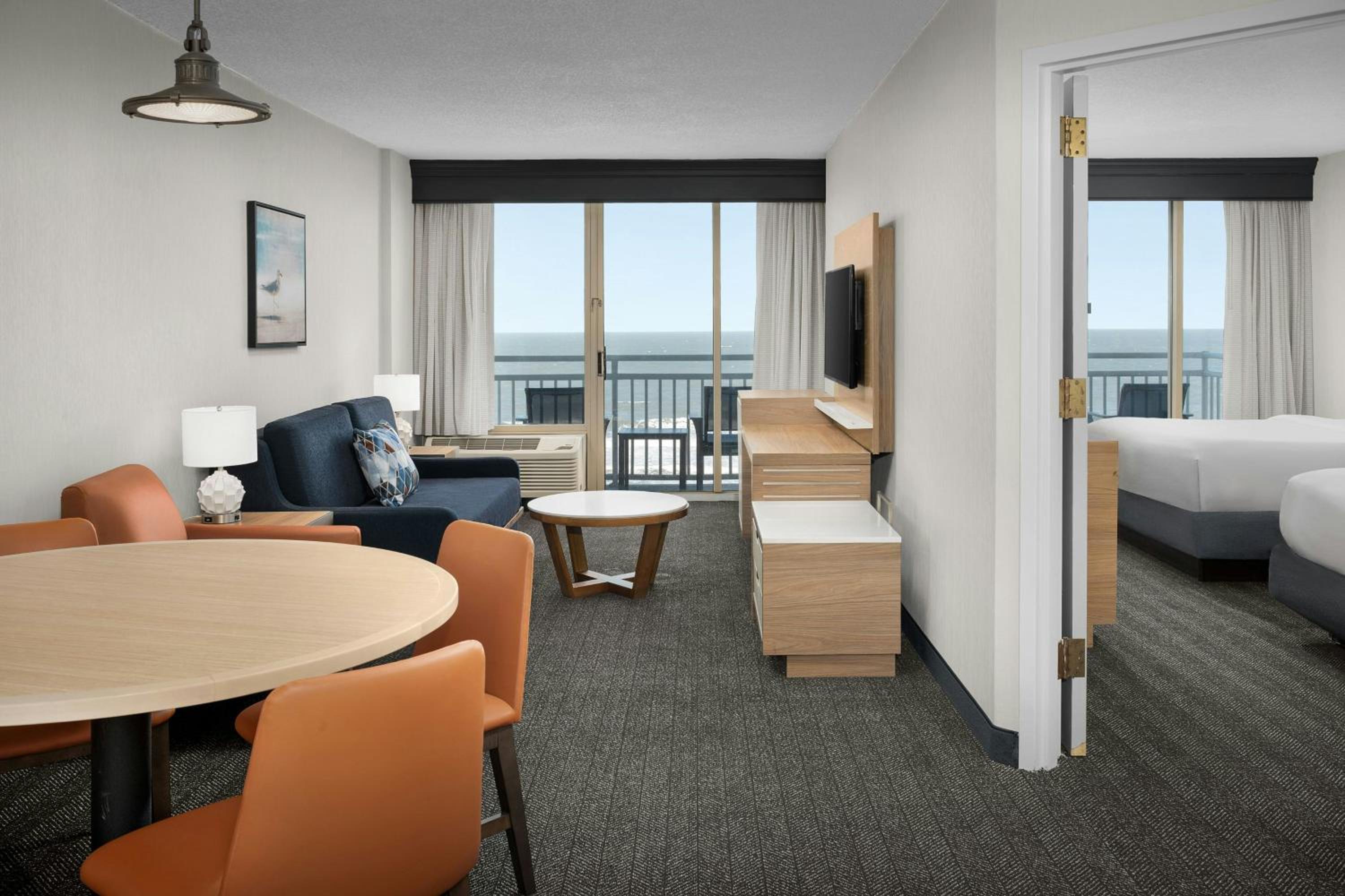 Larger One-Bedroom Suite with Two Queen Beds and Sofa Bed - Hearing Accessible
