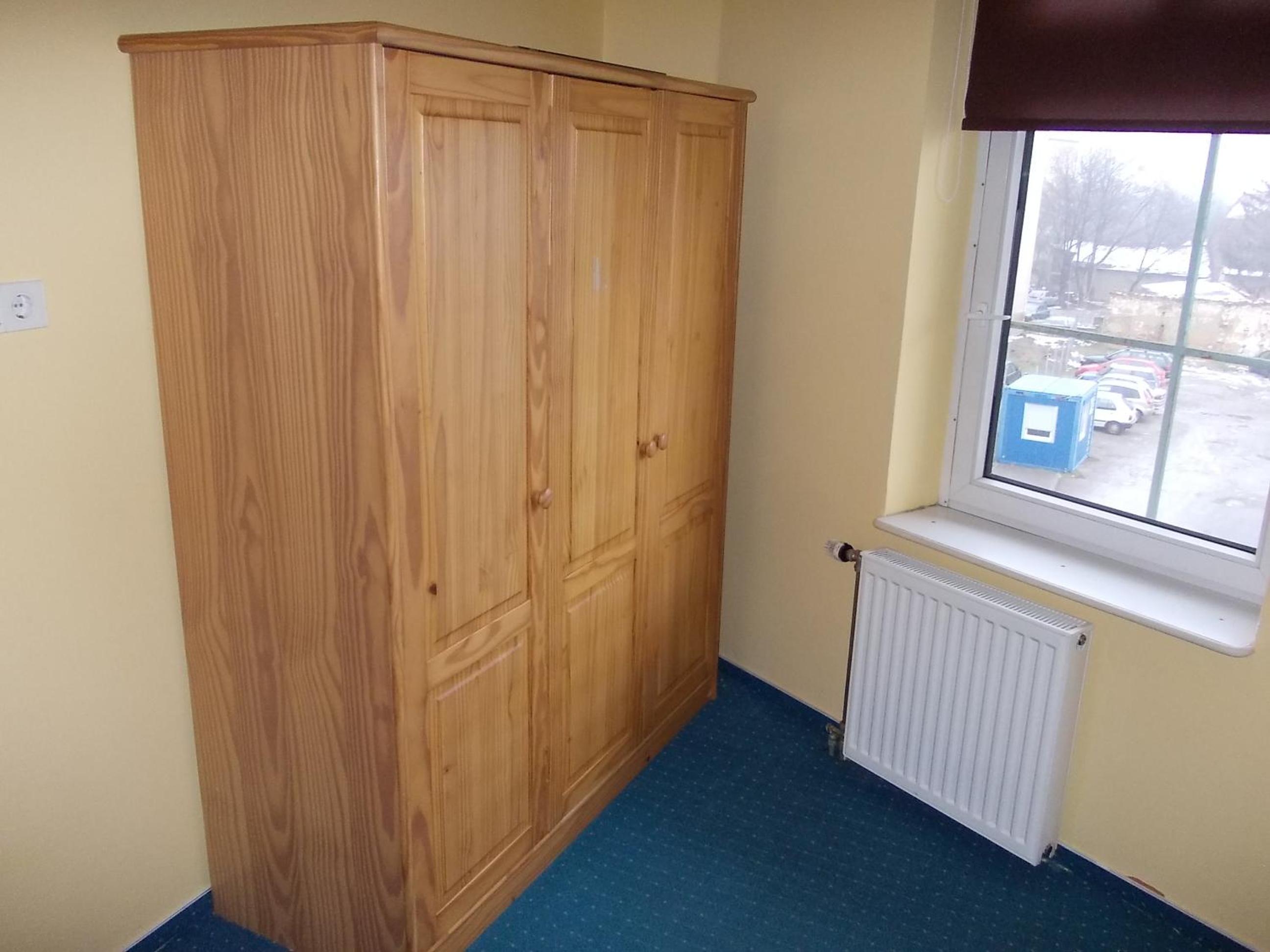 Three-Bedroom Apartment with Balcony - Photo 16