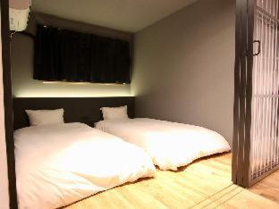 Standard Twin Room with Sofa and Shared Bathroom