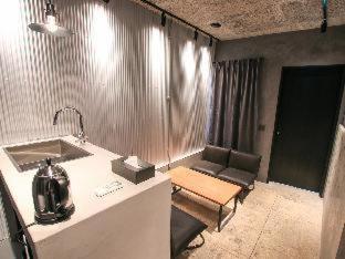 Standard Twin Room with Sofa and Shared Bathroom thumbnail 5