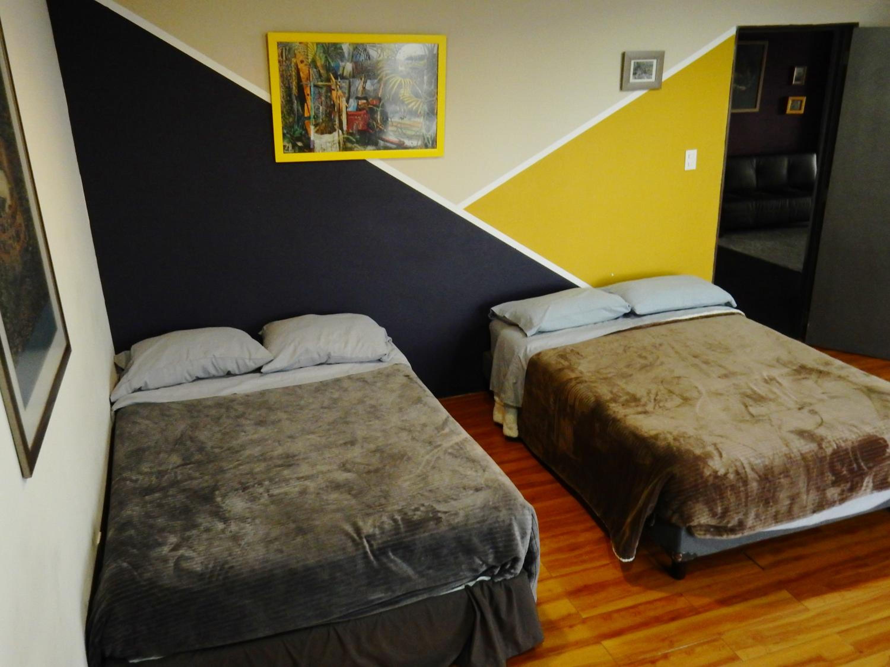 Quadruple Room with Private Bathroom - Photo 1