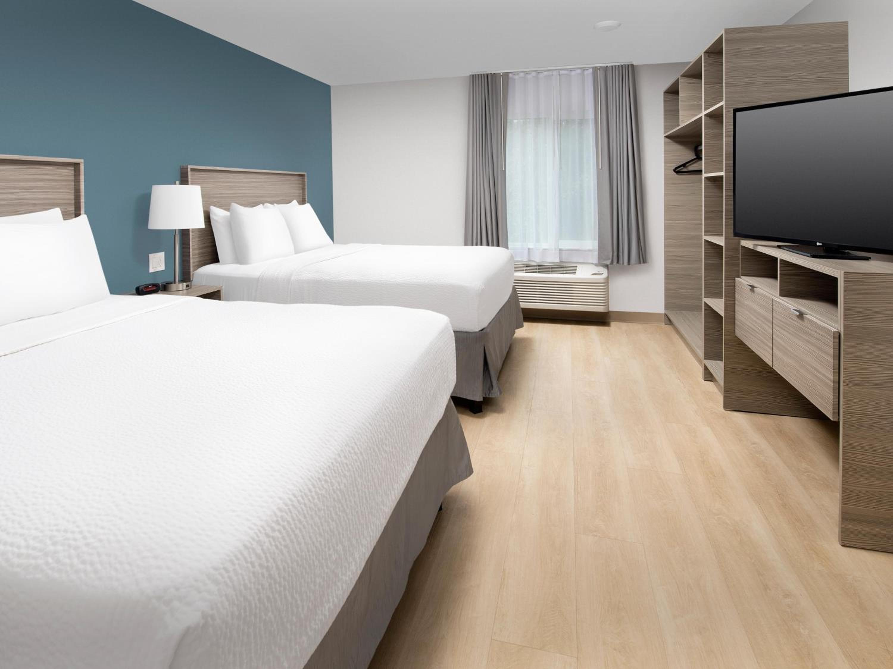 Standard Queen Room with Two Queen Beds - Non-Smoking photo 1