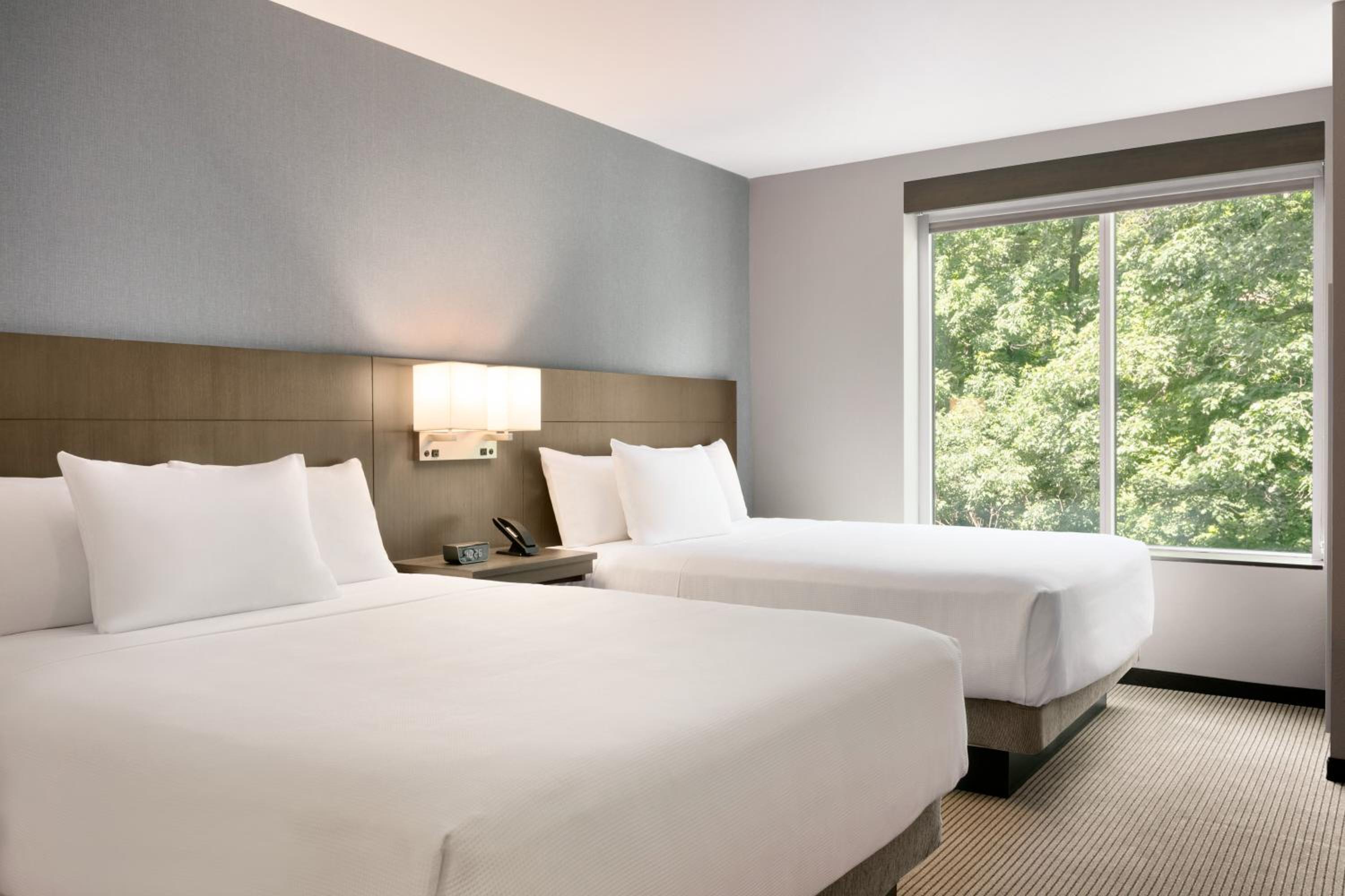 Queen Room with Two Queen Beds and Sofa Bed - Photo 2