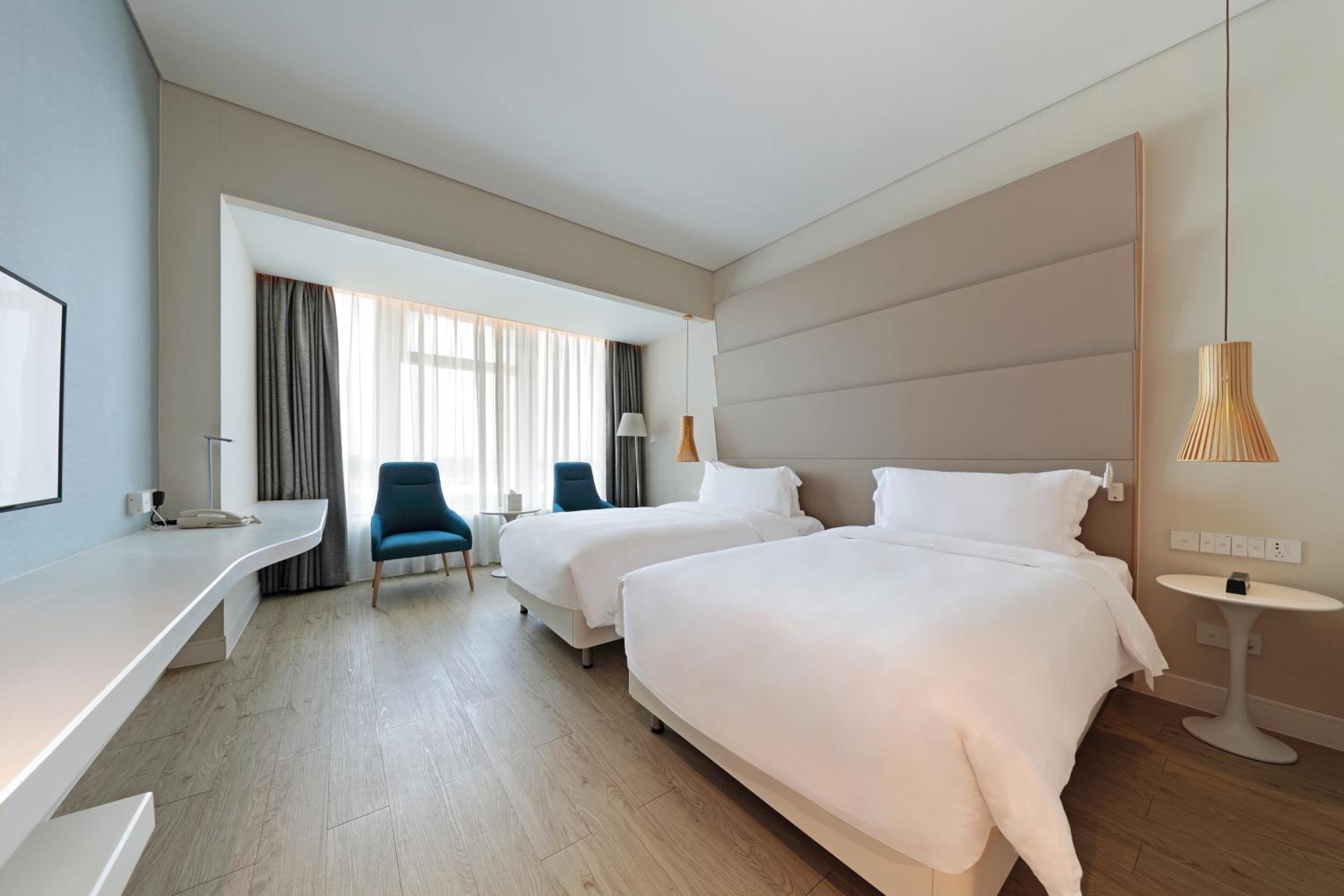 Deluxe Twin Room (5mins Walk to Meilan Airport) - Photo 3