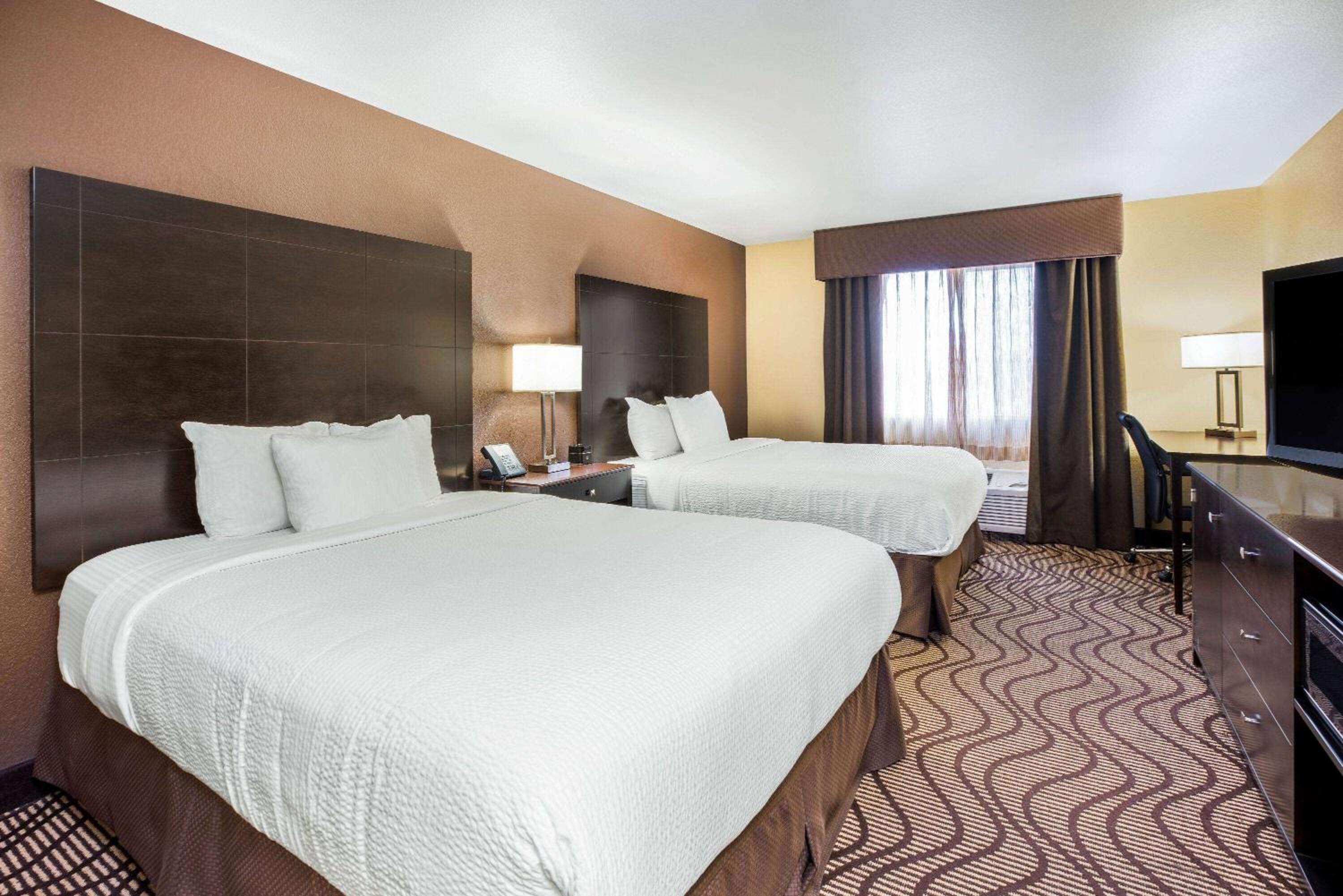 Deluxe Queen Room with Two Queen Beds - Photo 1
