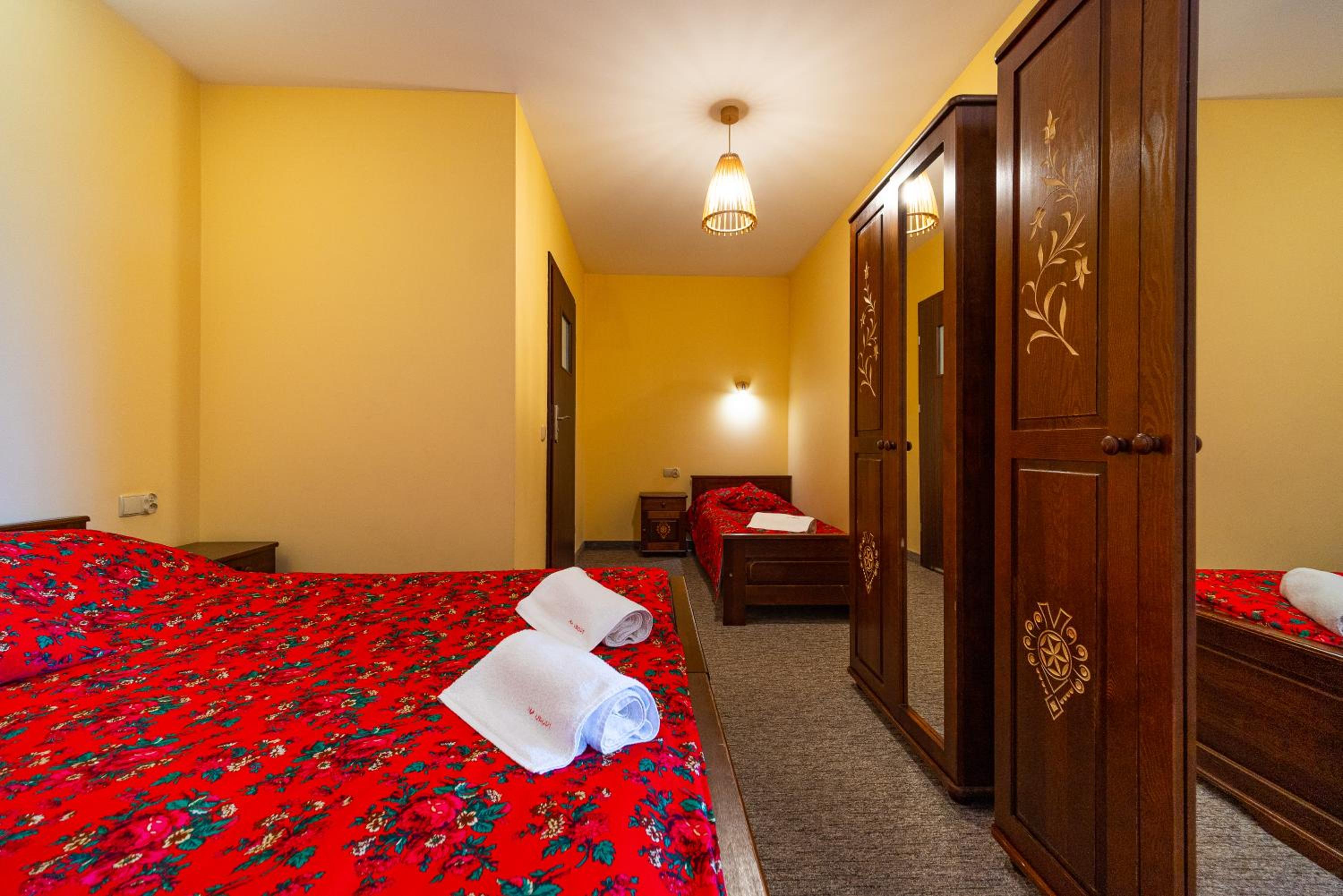 Deluxe Quadruple Room - Photo 12
