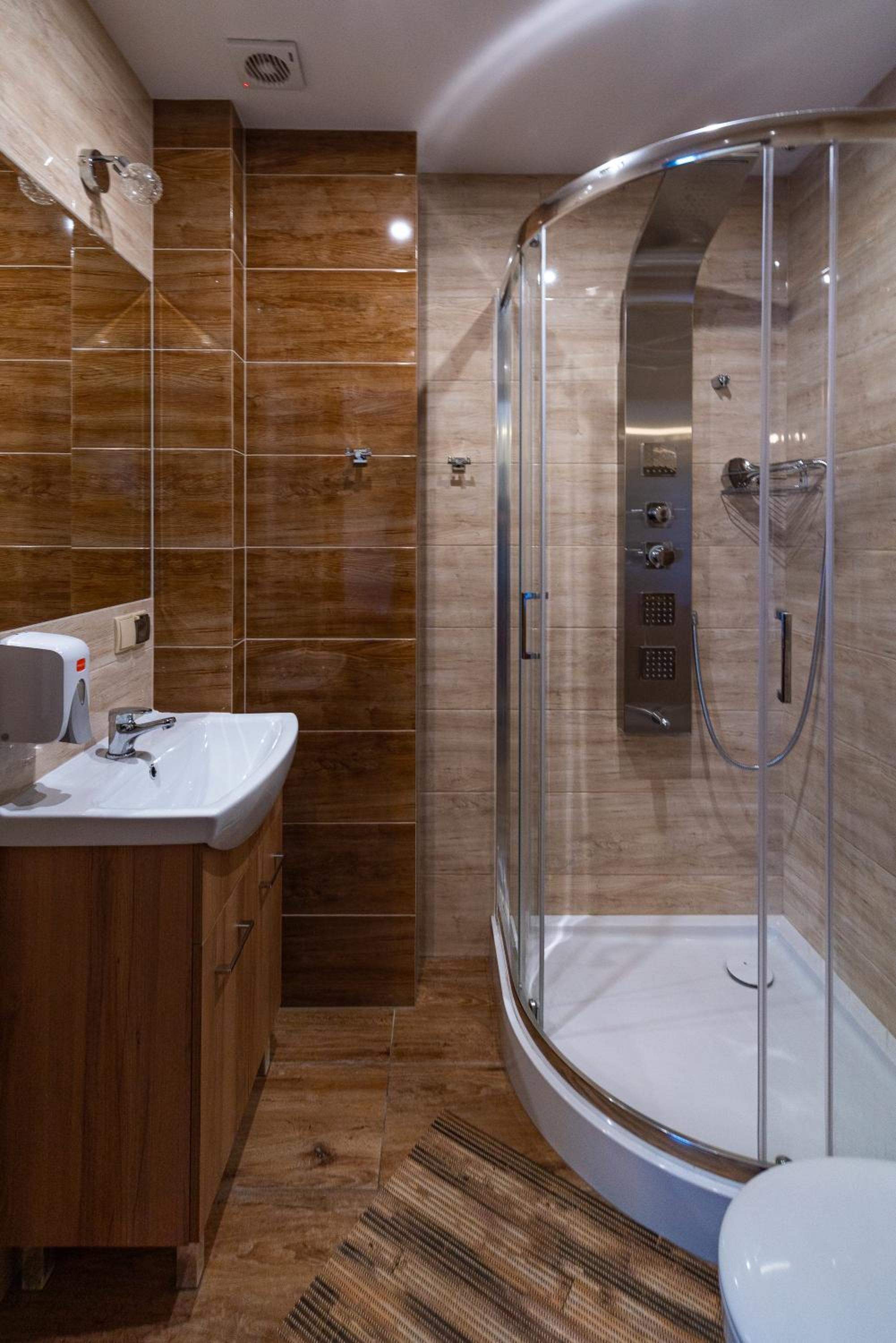Deluxe Quadruple Room - Photo 14