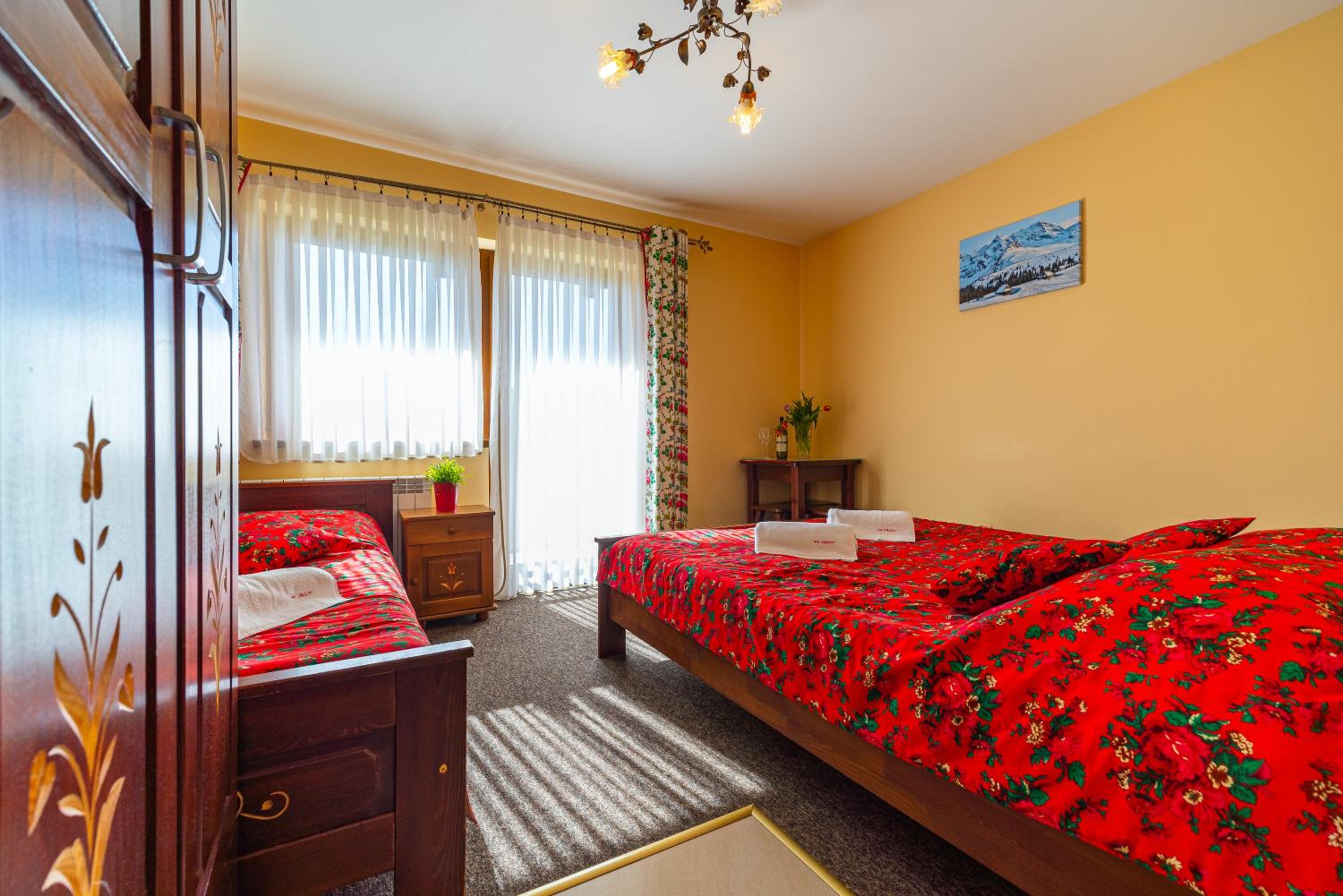 Deluxe Triple Room - Photo 17