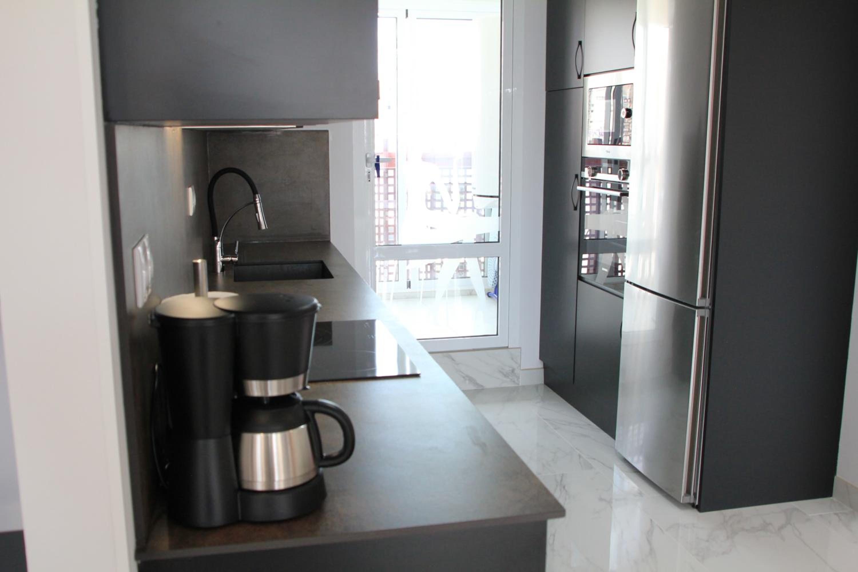 Three-Bedroom Apartment - Photo 22