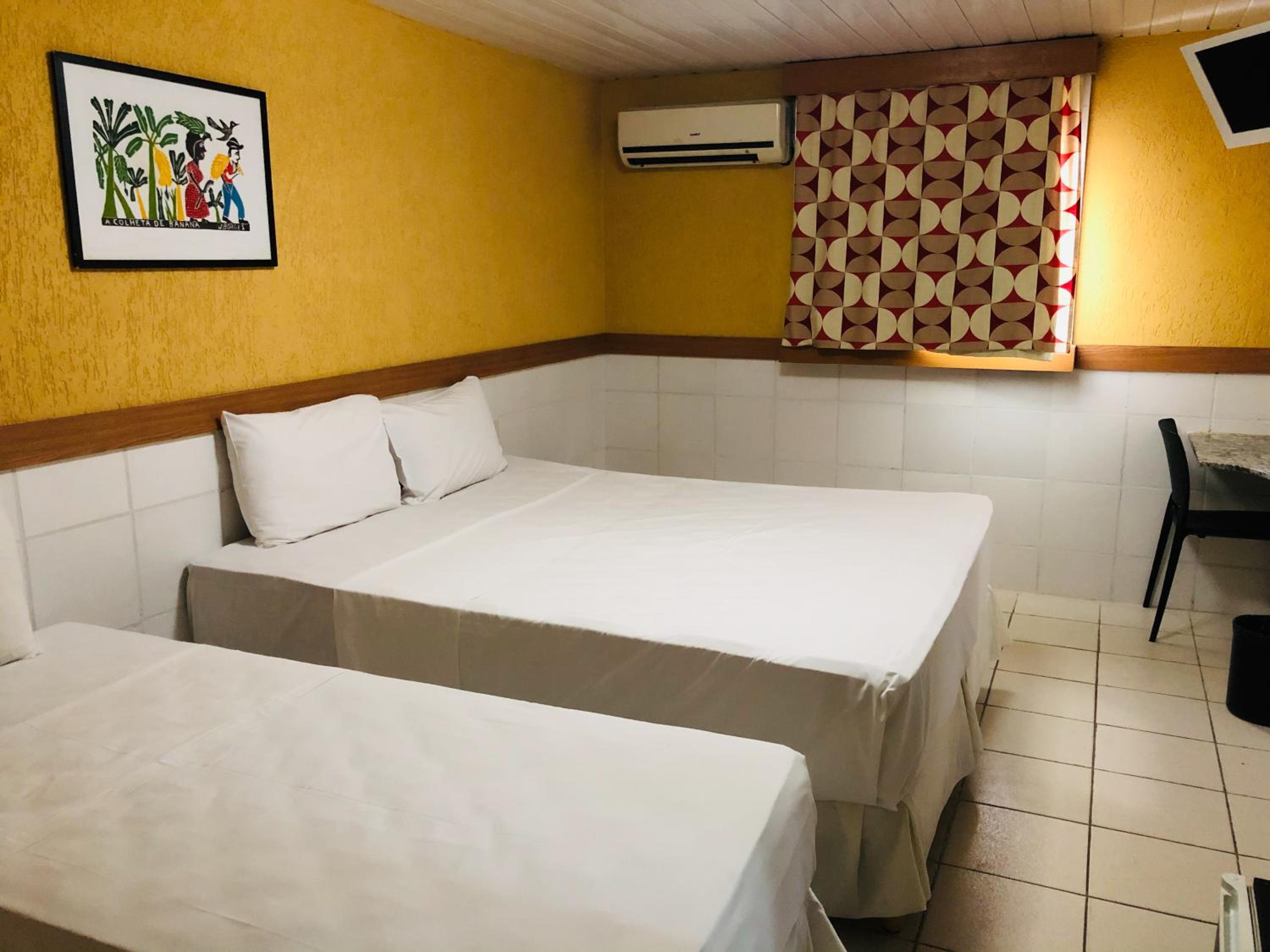 Triple Room (1 Double Bed + 1 Single Bed)