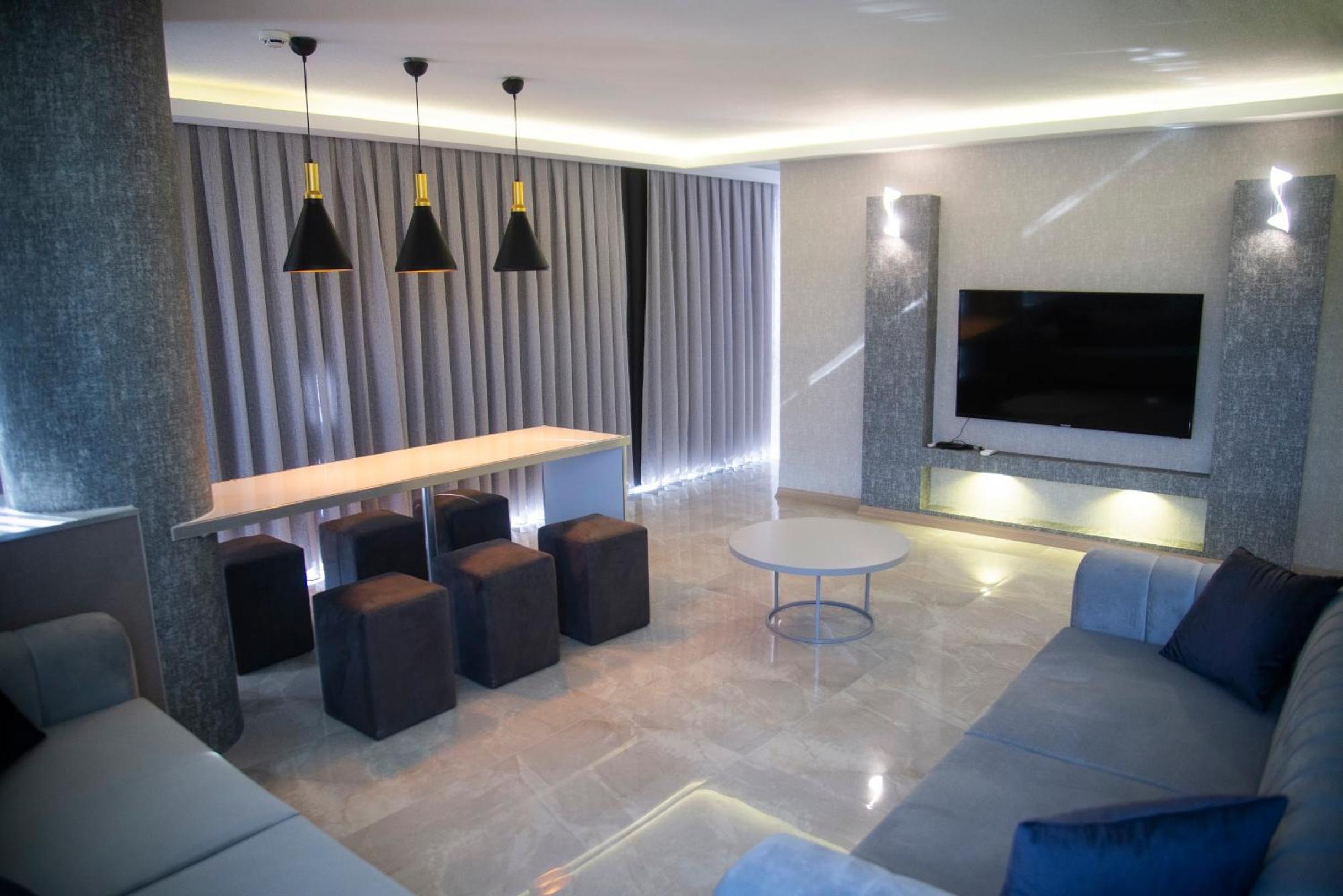 Three-Bedroom Apartment - Photo 10