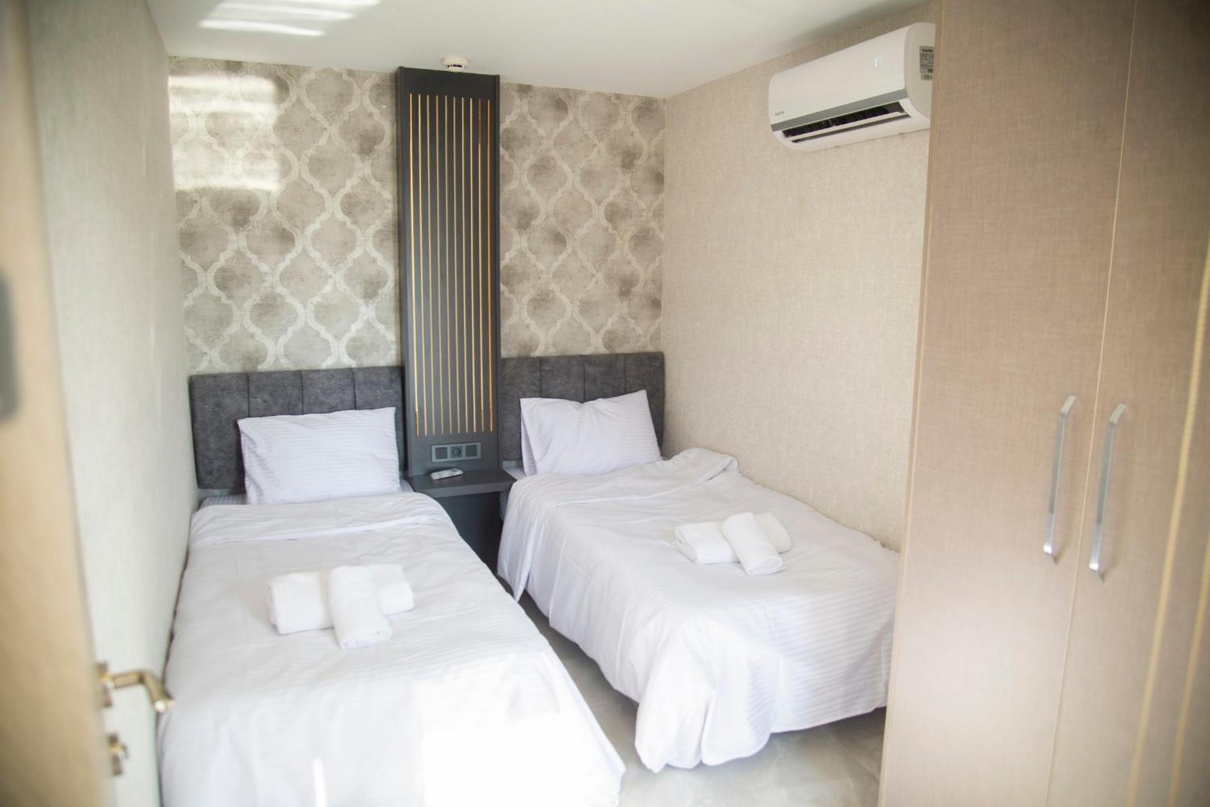 Three-Bedroom Apartment - Photo 2