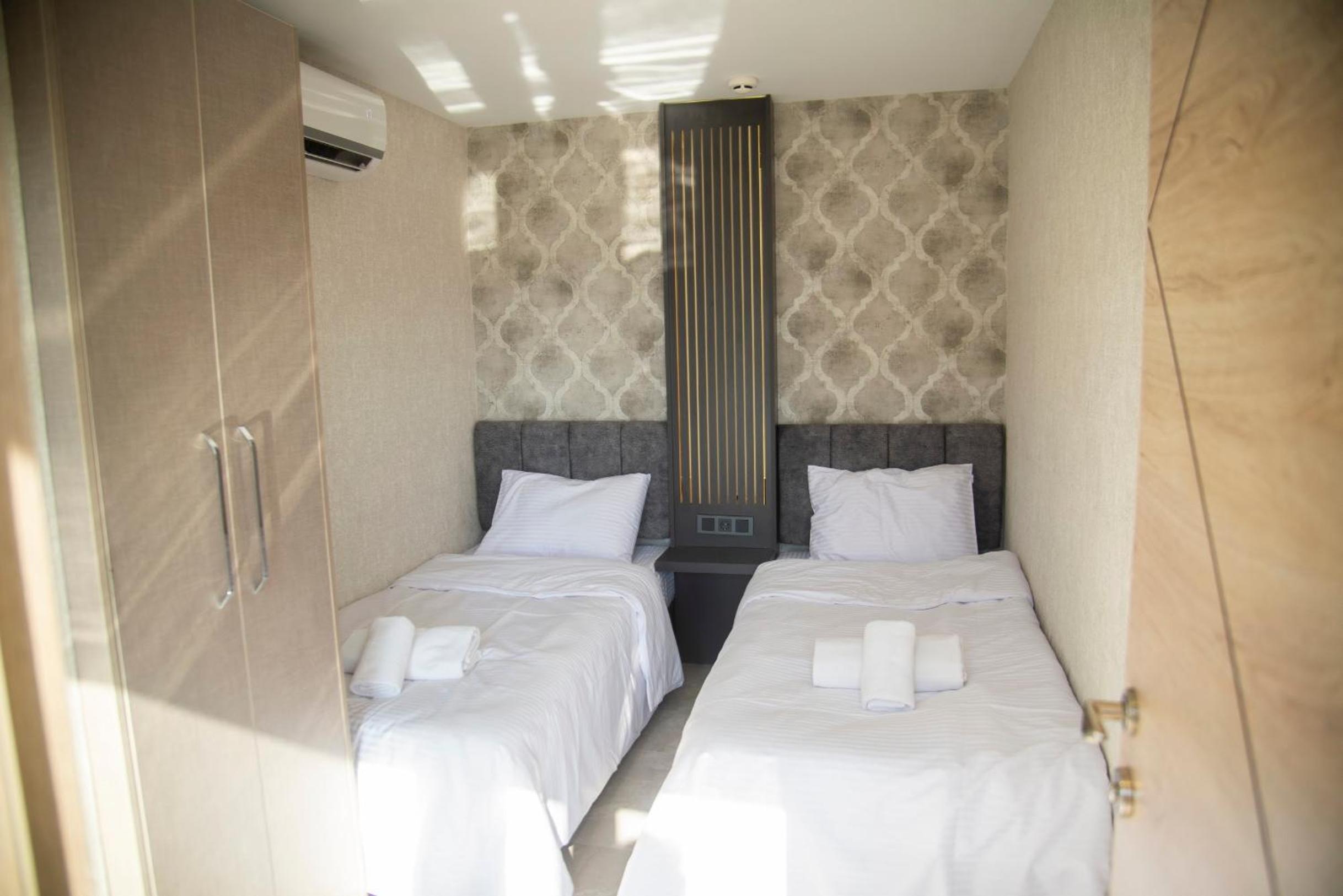 Three-Bedroom Apartment - Photo 3