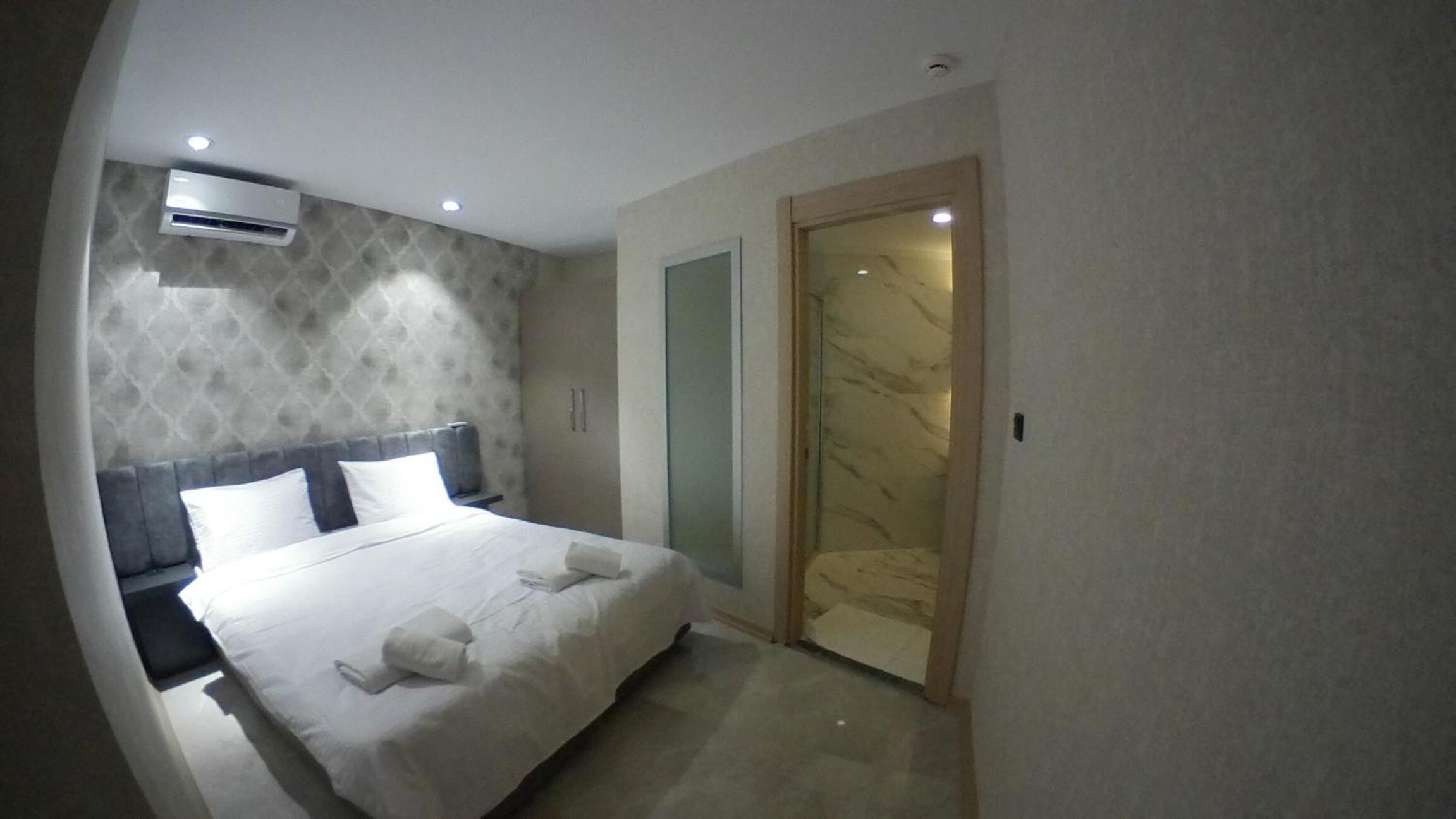 Three-Bedroom Apartment - Photo 22
