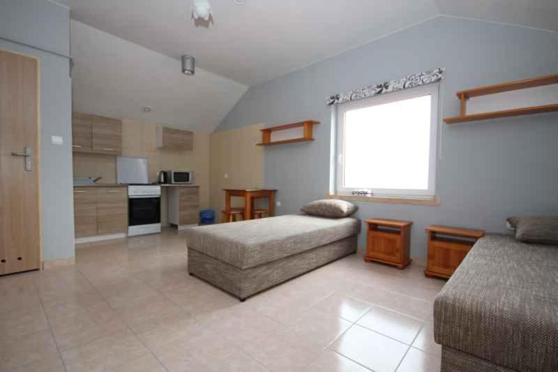 Premium Quadruple Room - Photo 1