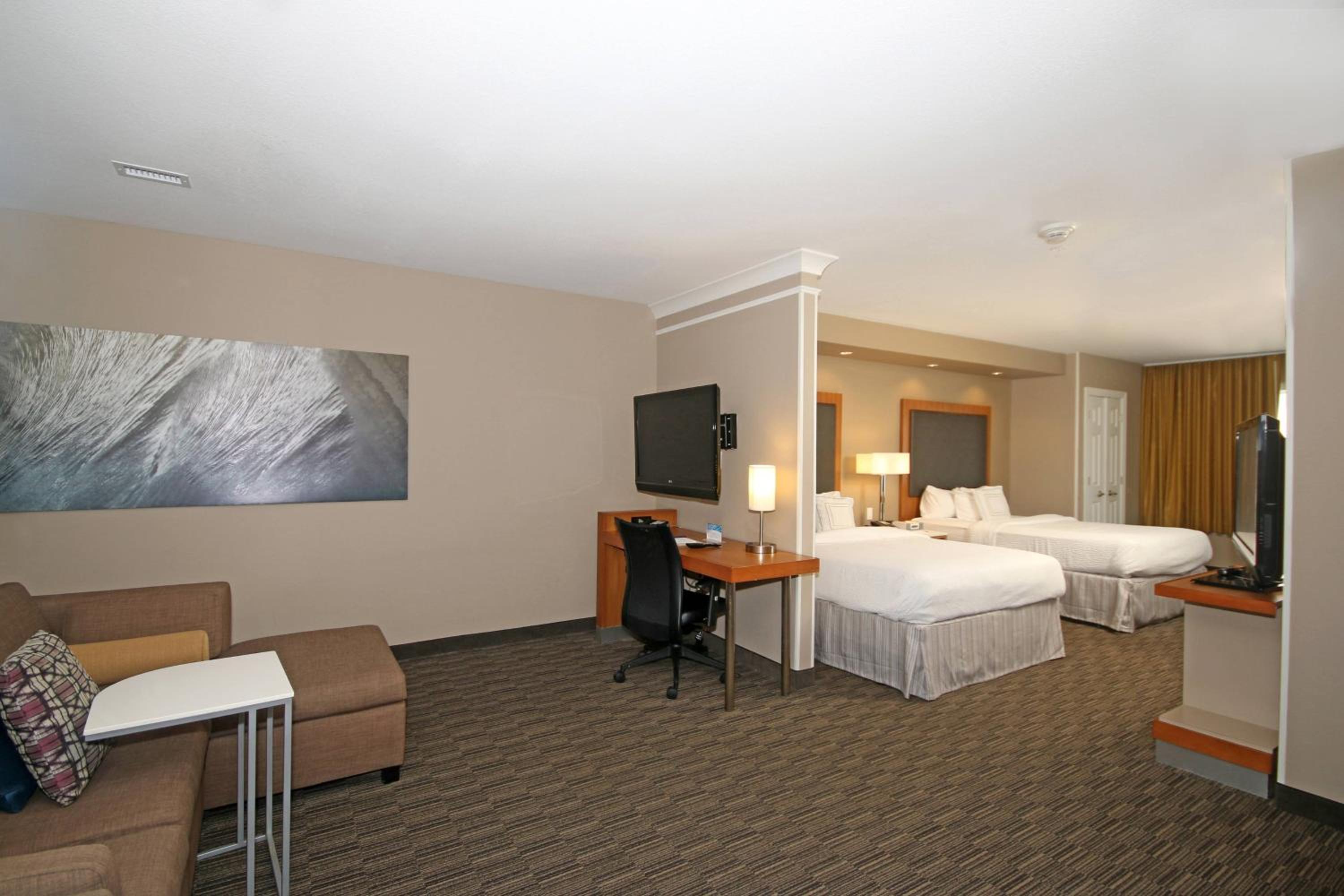 Queen Suite with Two Queen Beds, Roll-In Shower and Trundle Sofa - Mobility Access