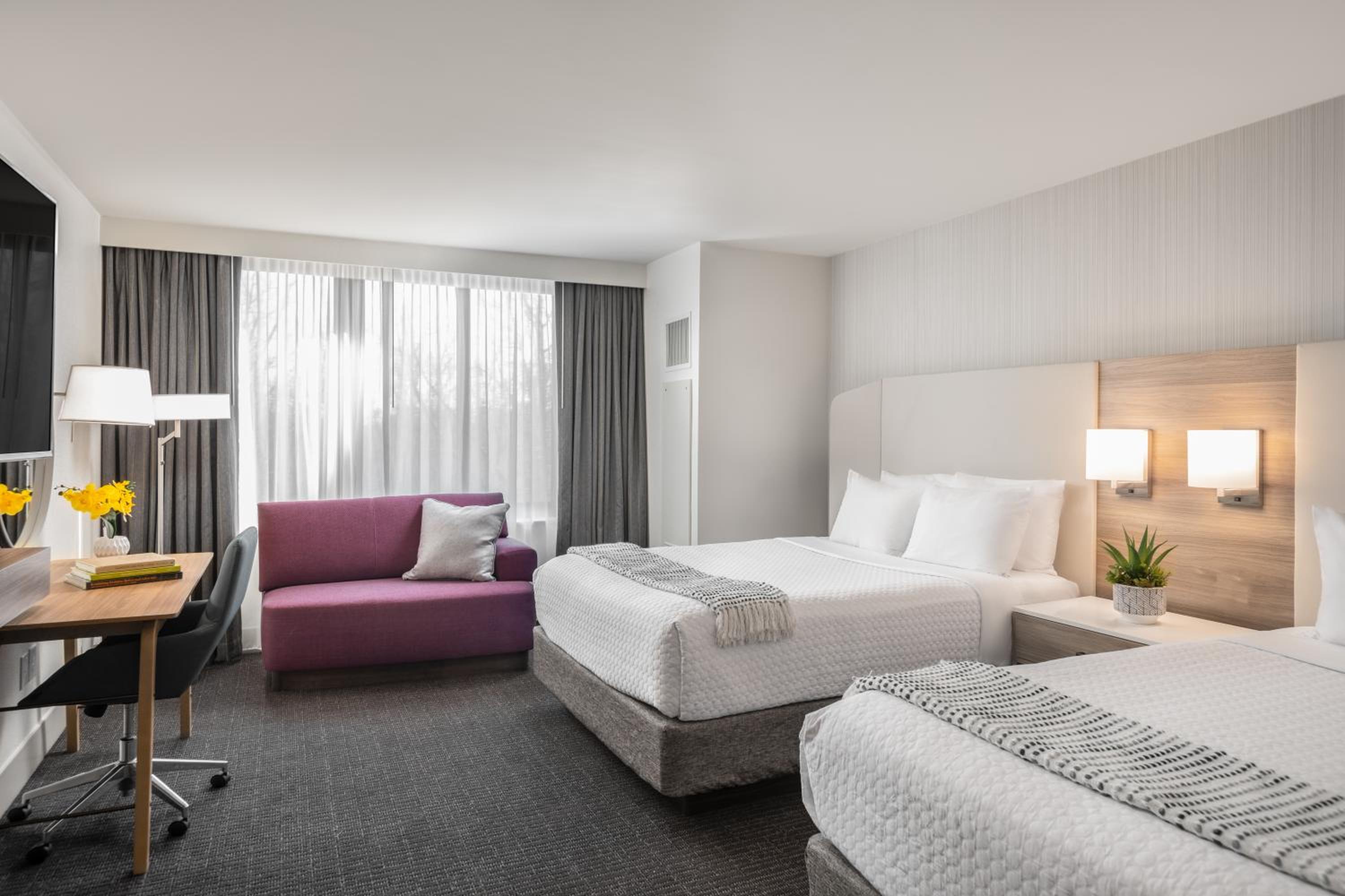 Premium Corner Queen Room with Two Queen Beds photo 2